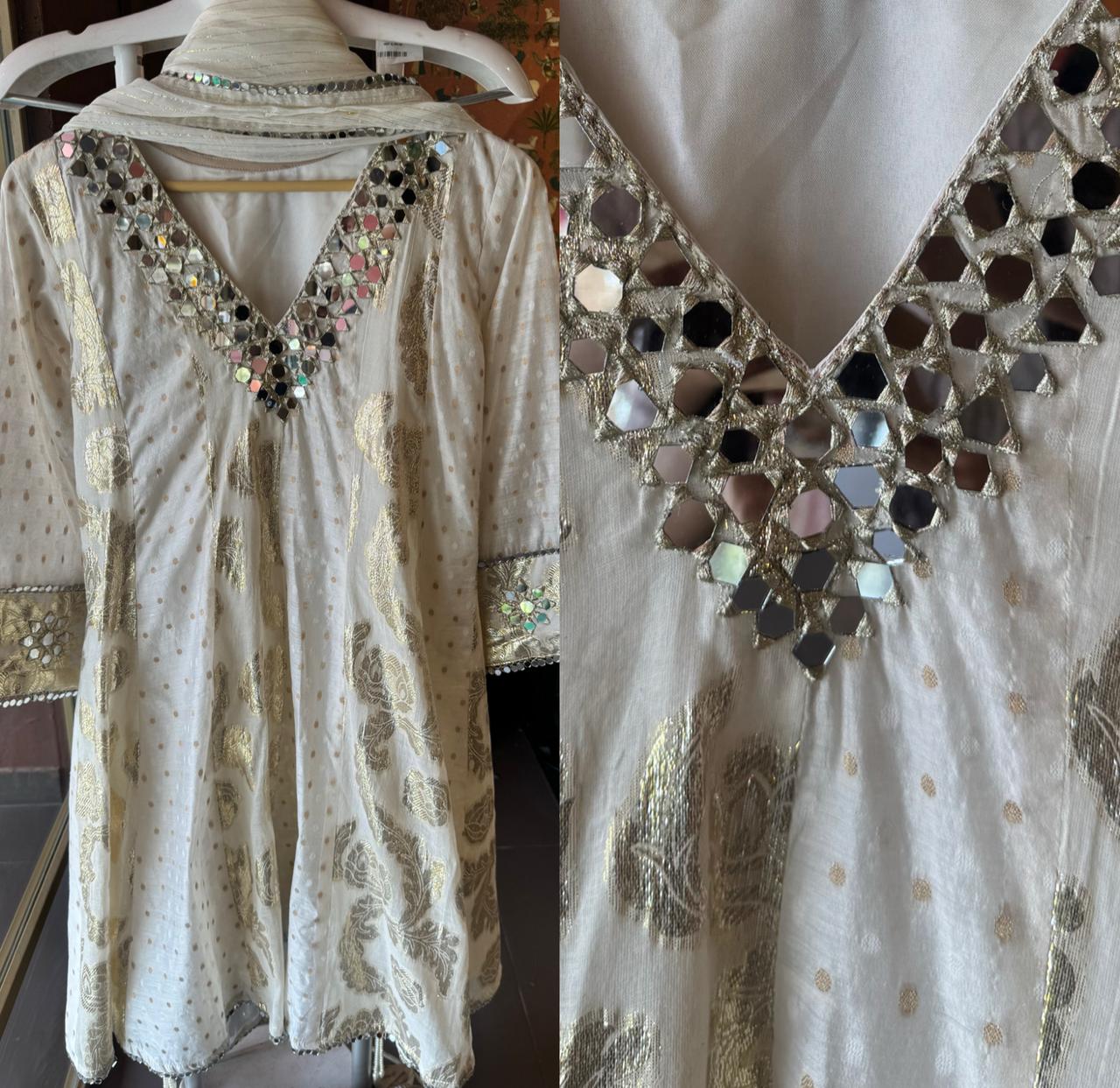 Presenting a very gorgeous stitched ivory full flared Anarkali suit