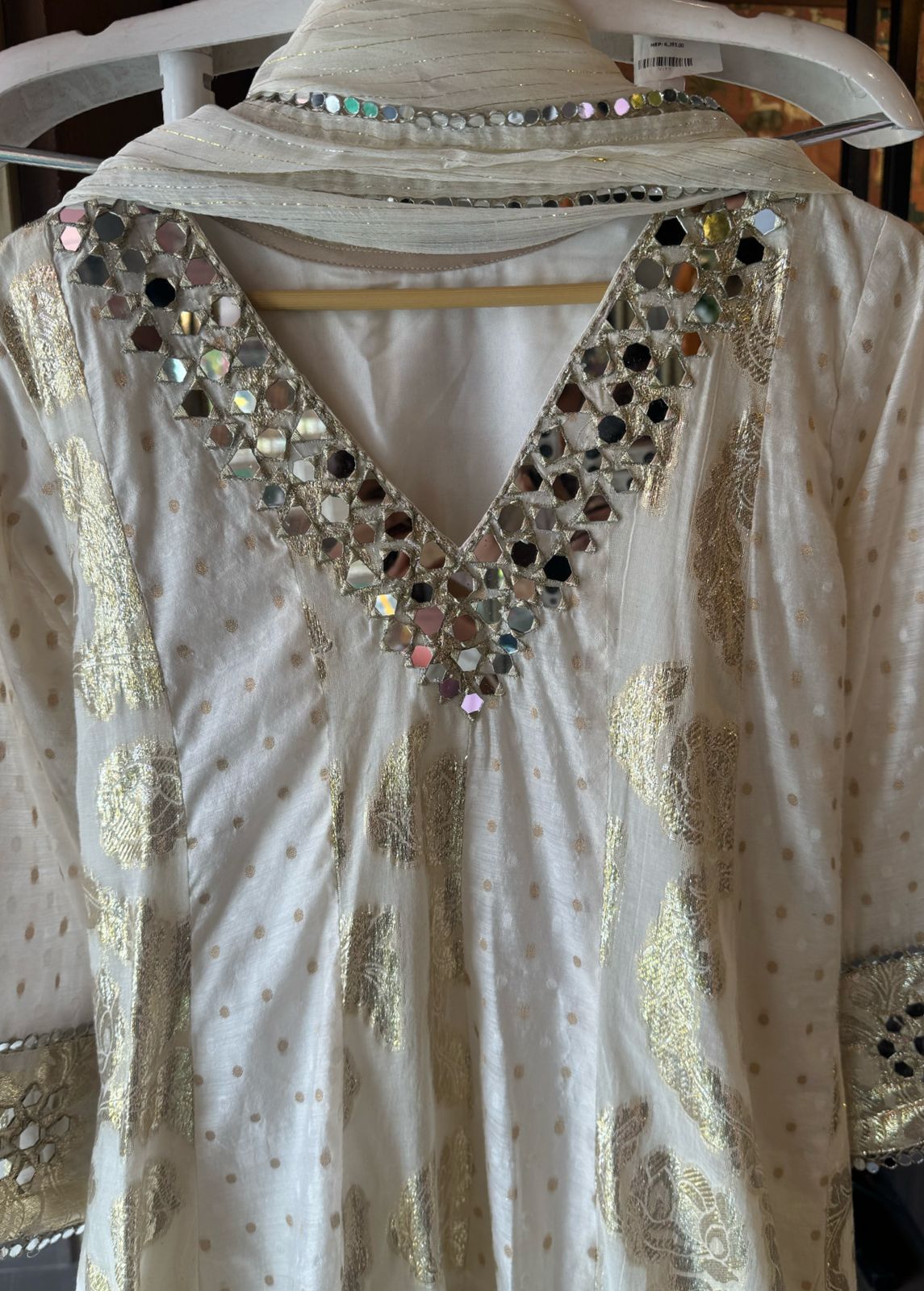 Presenting a very gorgeous stitched ivory full flared Anarkali suit with duppatta