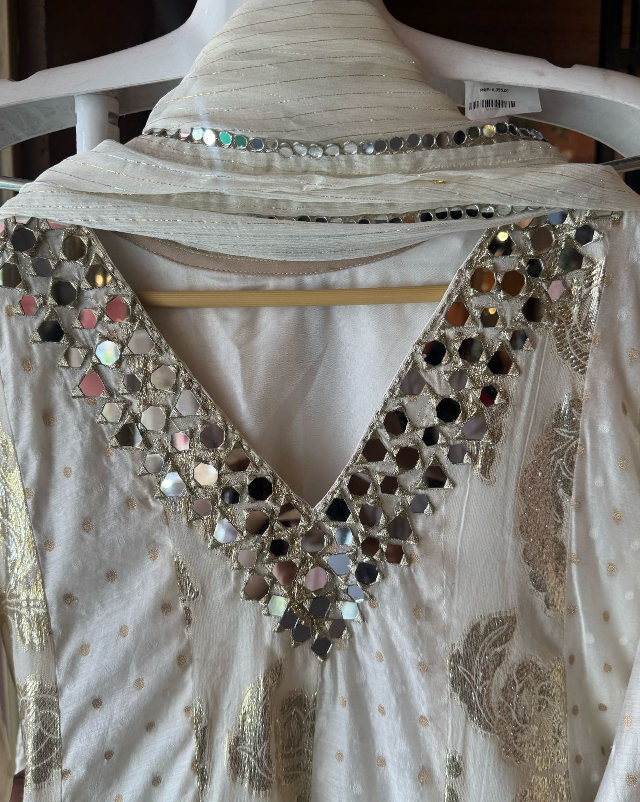 Presenting a very gorgeous stitched ivory full flared Anarkali suit with duppatta