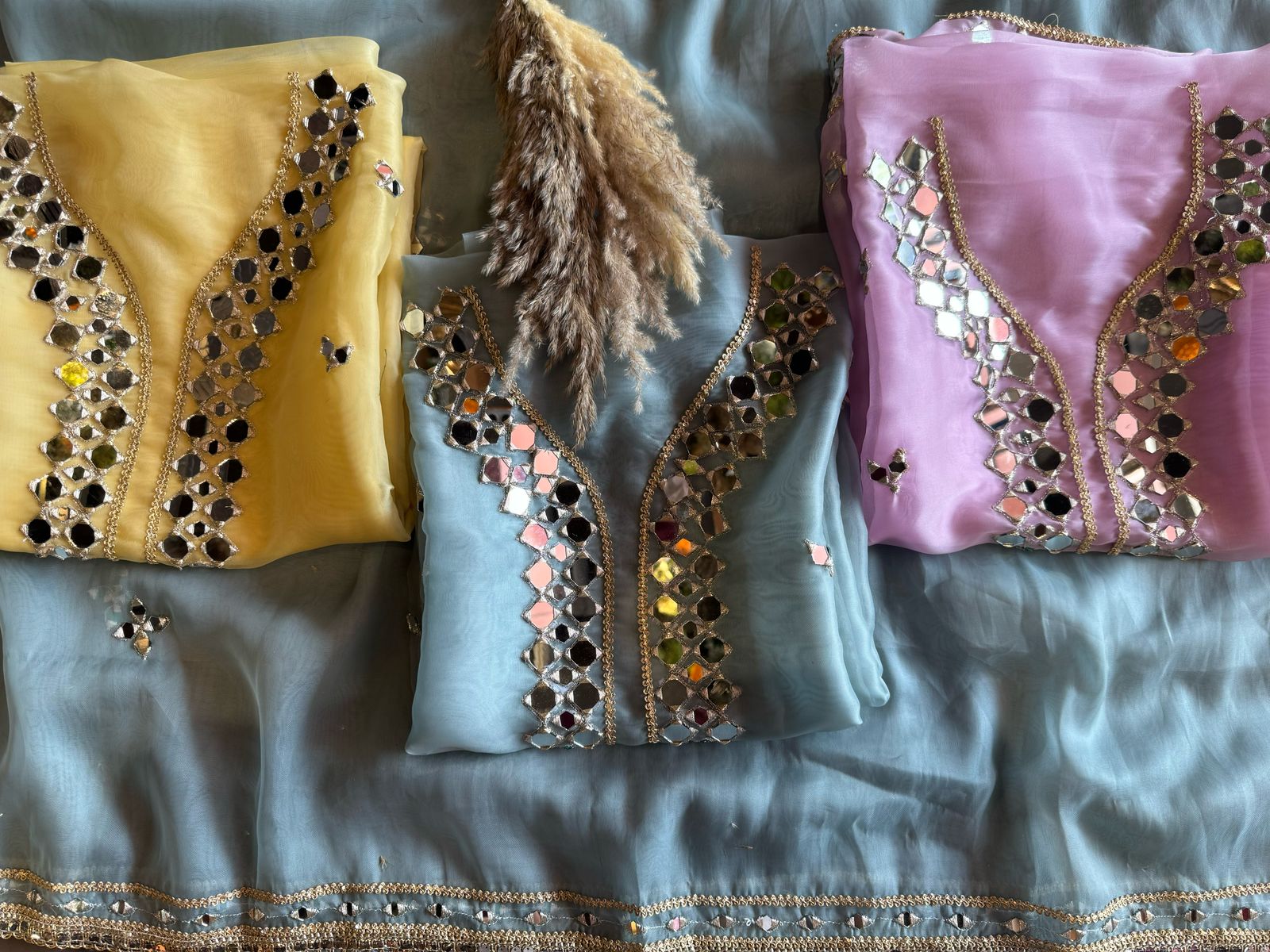 Shop our latest Mirror work tissue suits