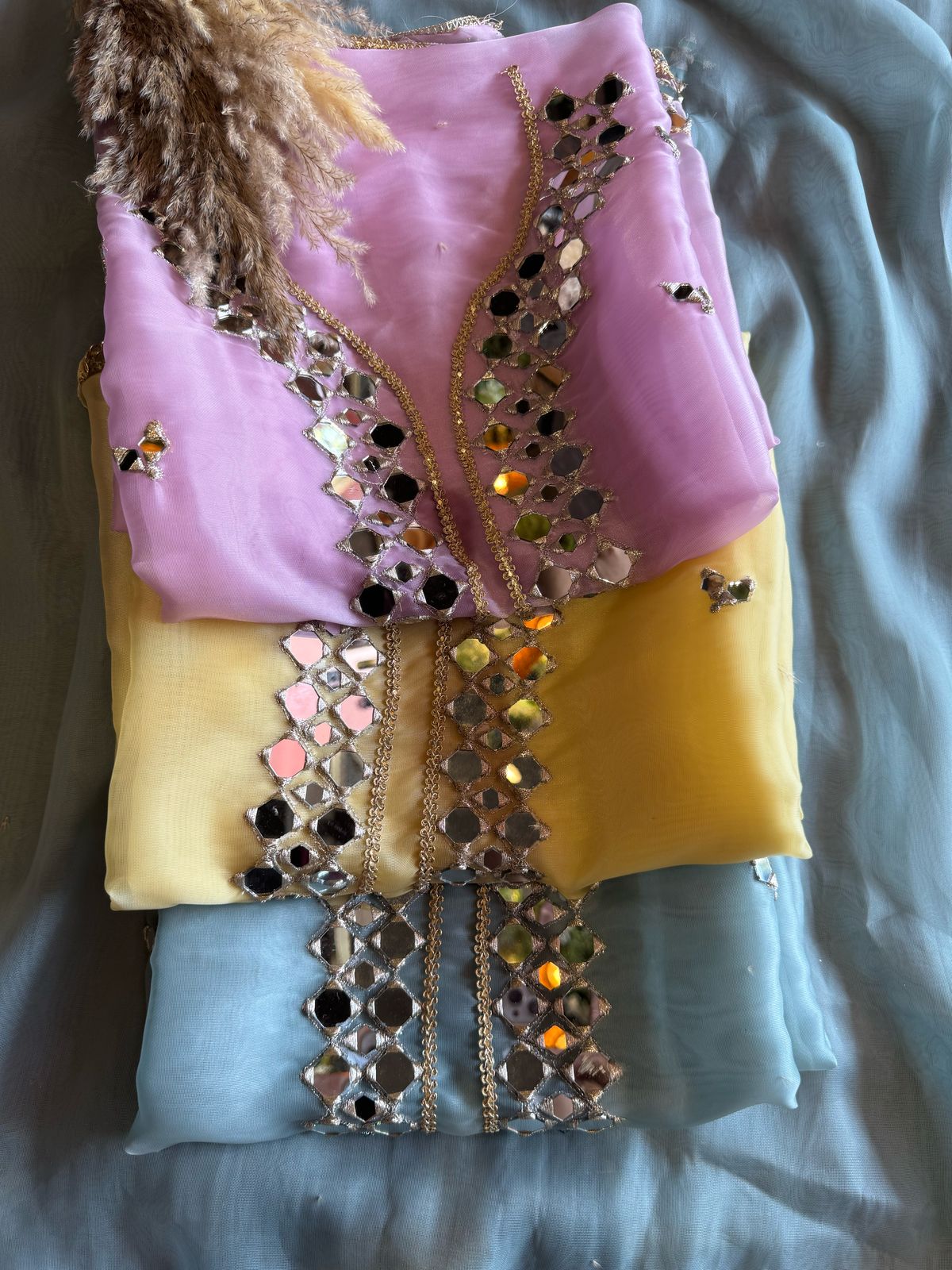 Shop our latest Mirror work tissue suits