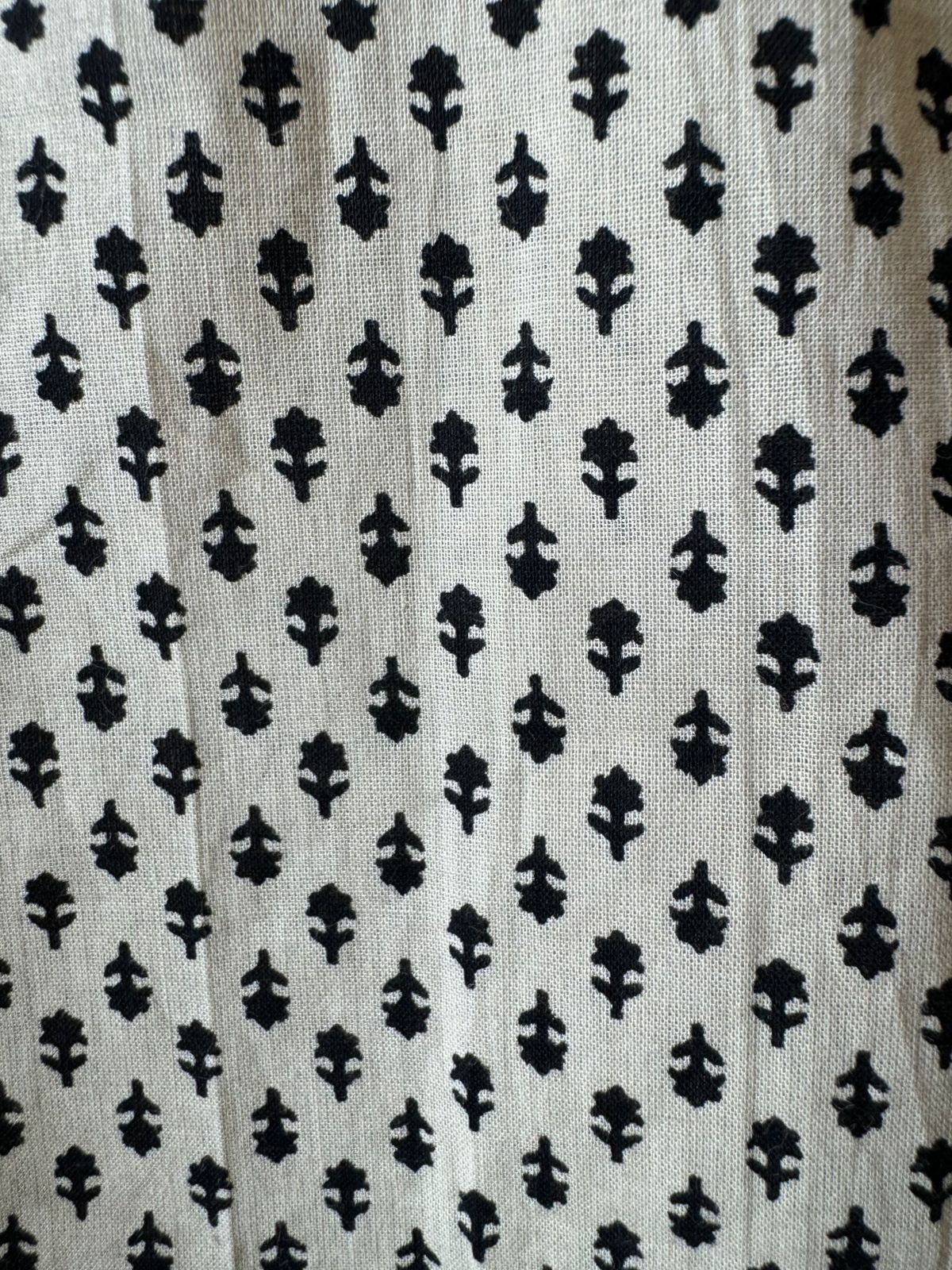 The fabric in the image is a traditional and vibrant unstitched dress