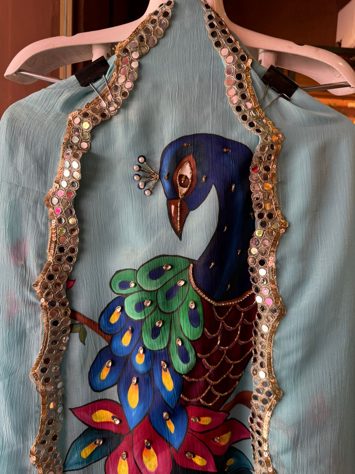 The image shows a beautifully detailed and elegant ethnic outfit