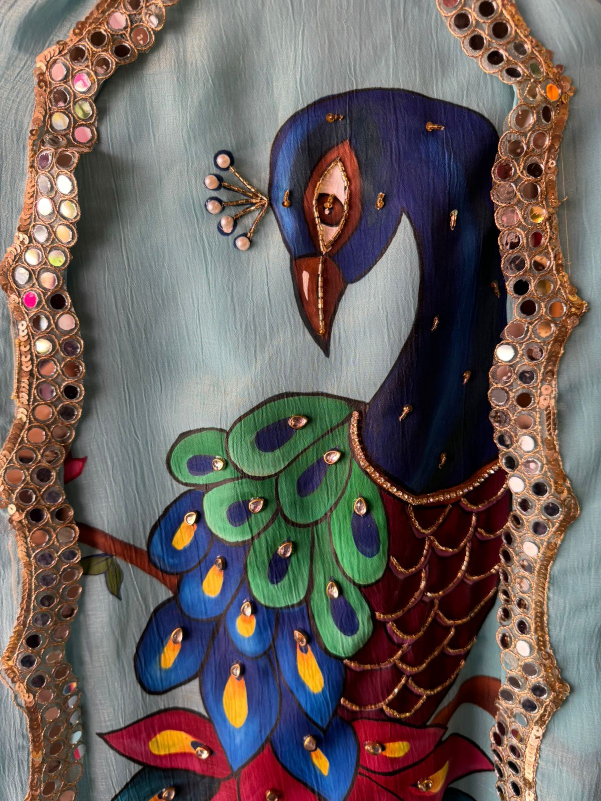 The image shows a beautifully detailed and elegant ethnic outfit