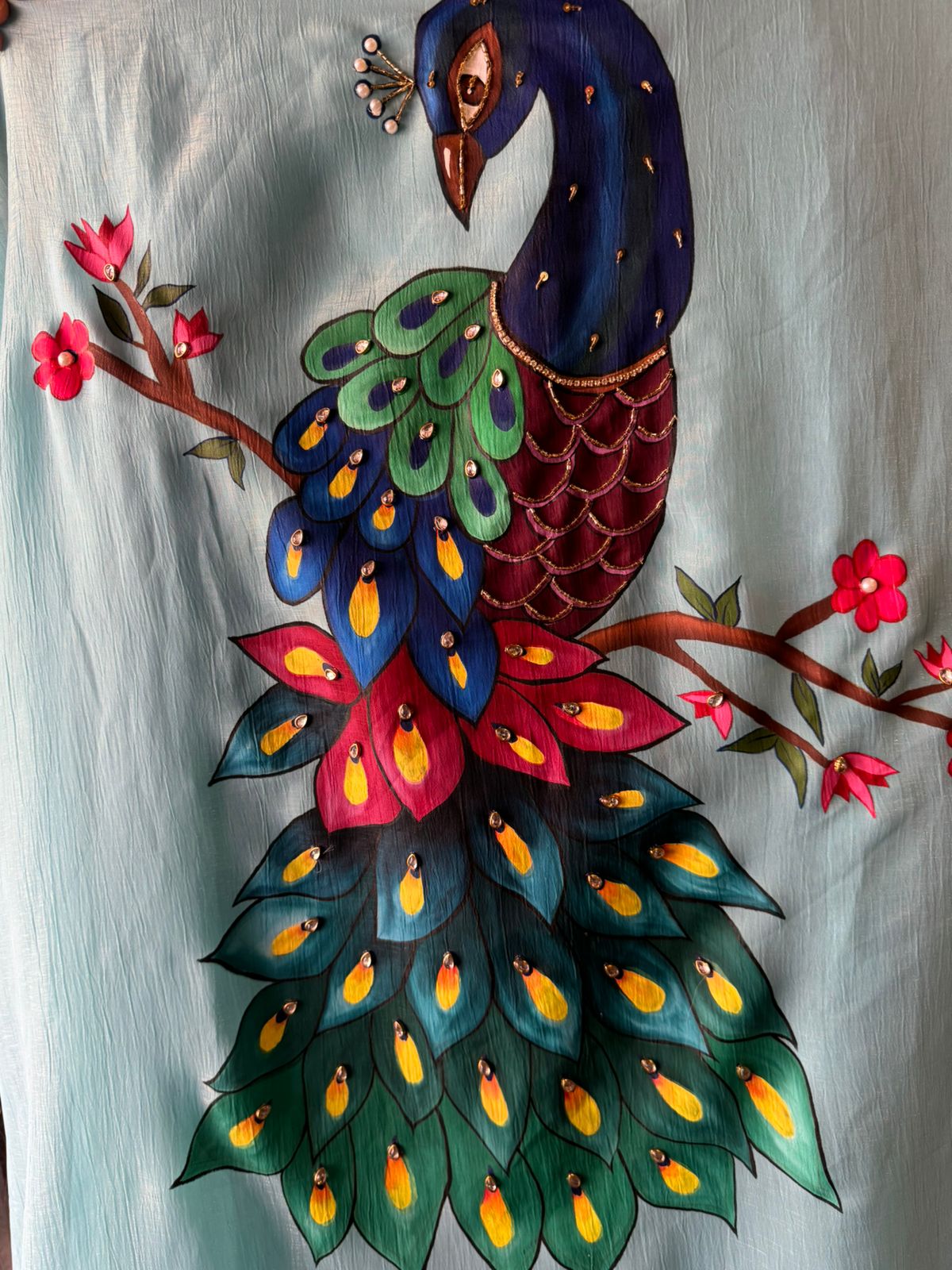 The image shows a beautifully detailed and elegant ethnic outfit