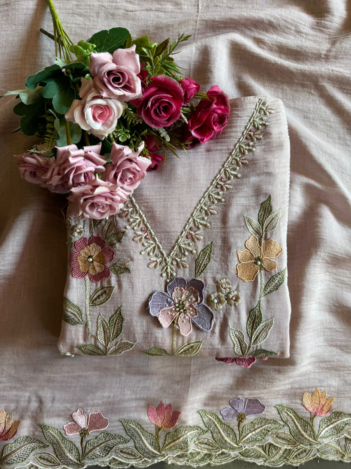 Unstitched suit  design with floral thread embroidered Front