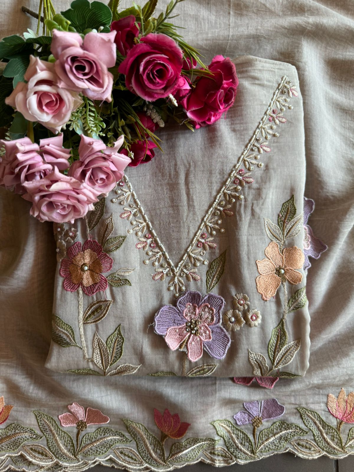 Unstitched suit  design with floral thread embroidered Front