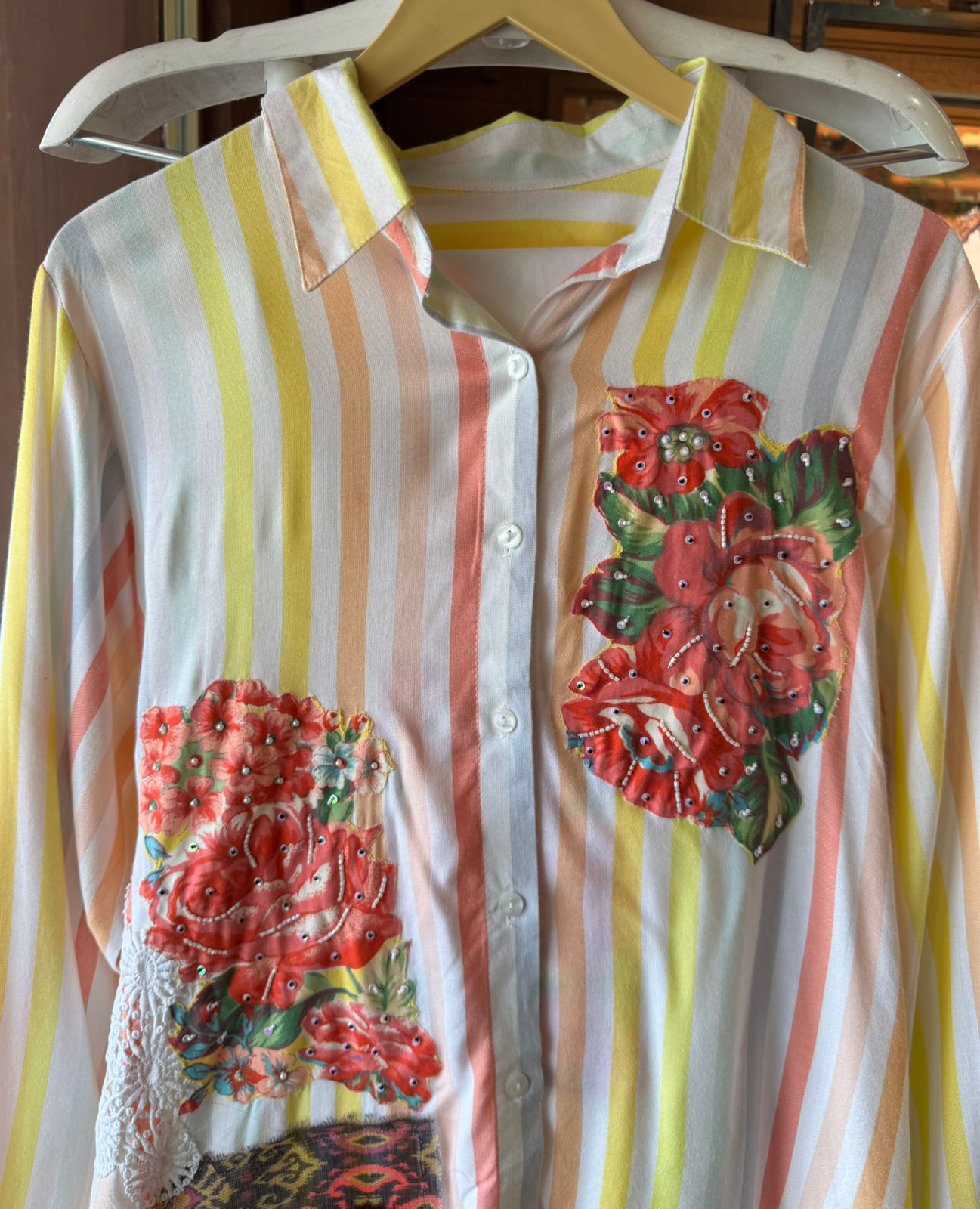 Shirt style with Collar neck design with Button detailing on the front