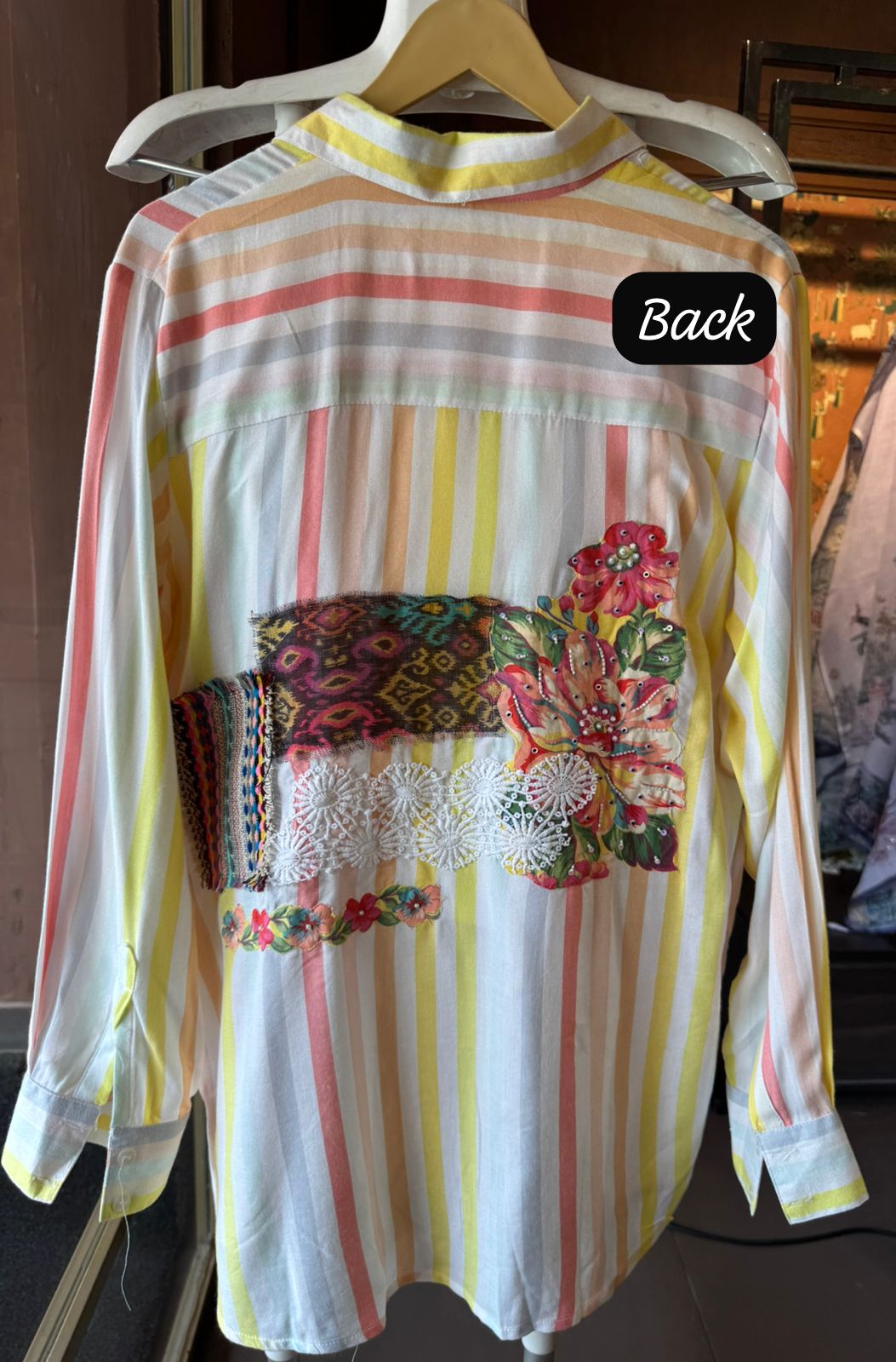 Shirt style with Collar neck design with Button detailing on the front