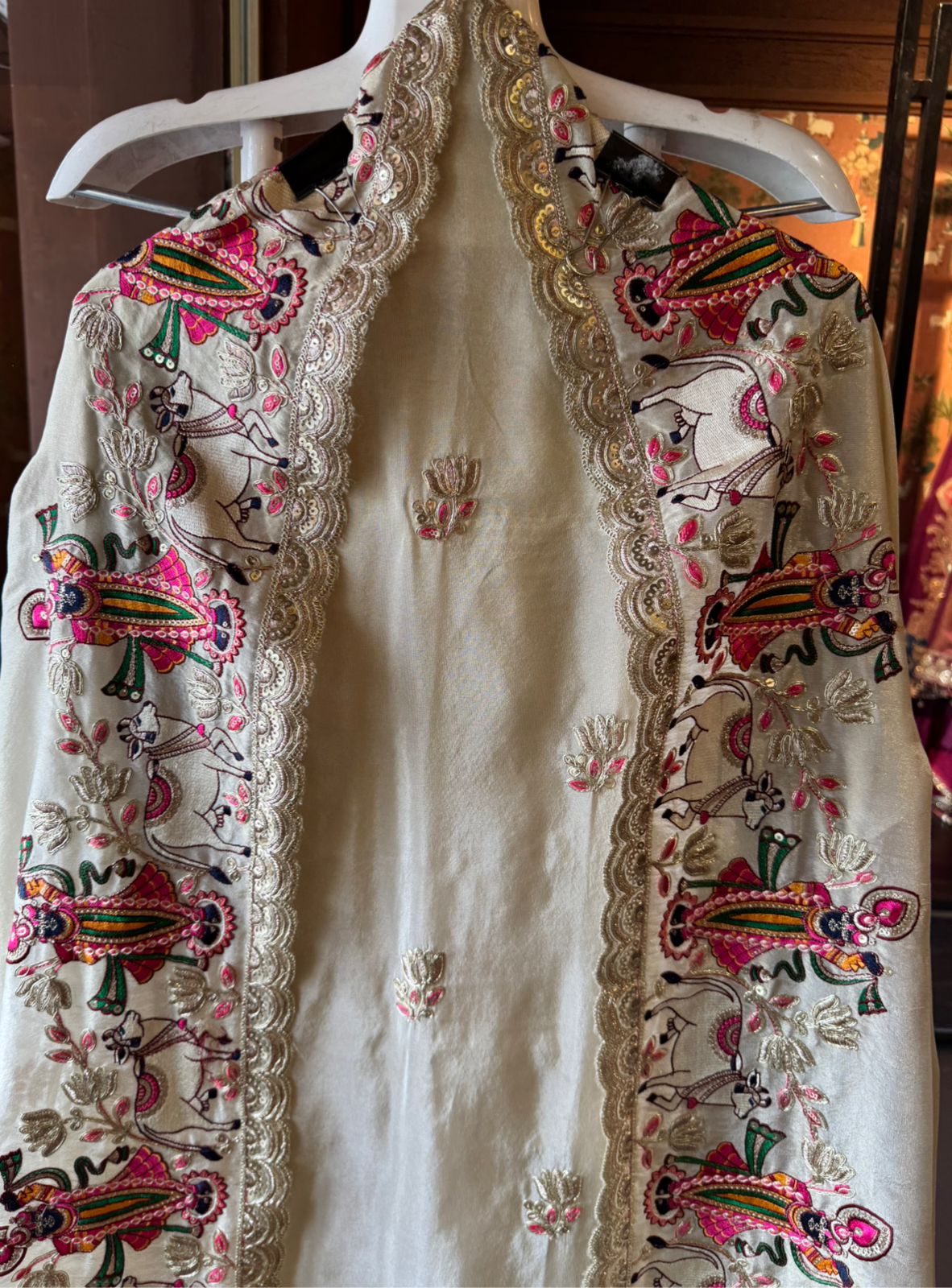 stunning suit features Beautiful Shrinath ji