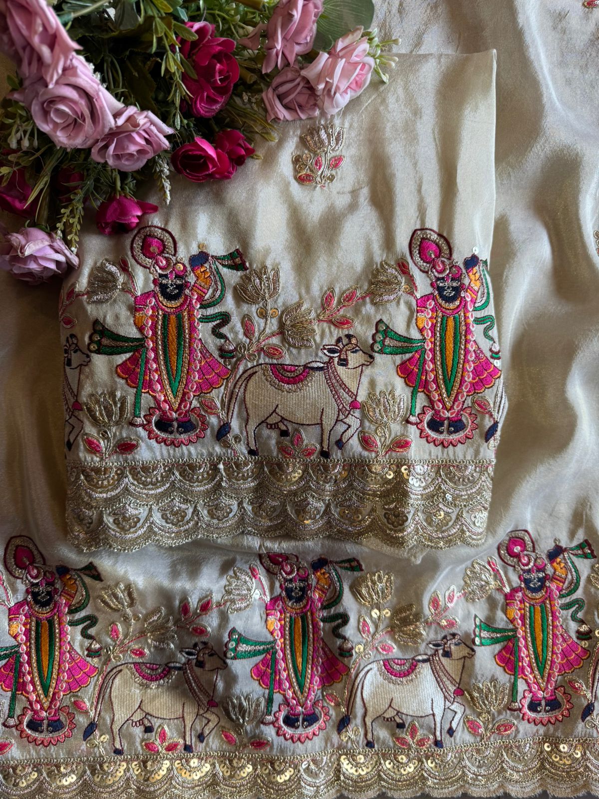 stunning suit features Beautiful Shrinath ji