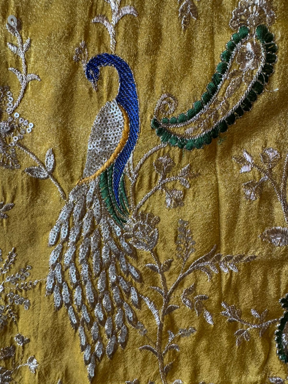 zardozi-style embroidery on shimmer tissue