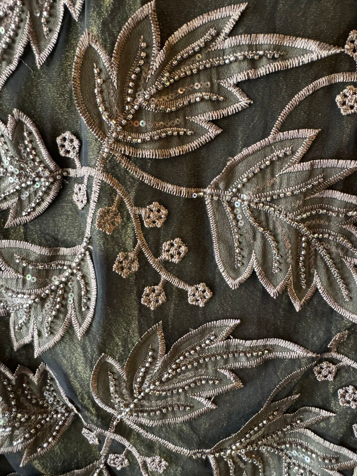 mesh/net fabric heavily embroidered with leaf and small floral motifs