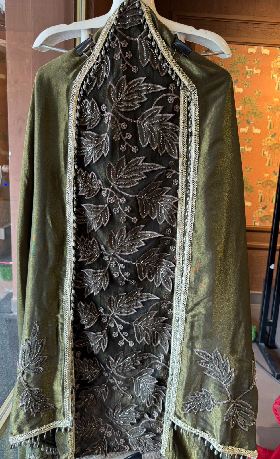 mesh/net fabric heavily embroidered with leaf and small floral motifs