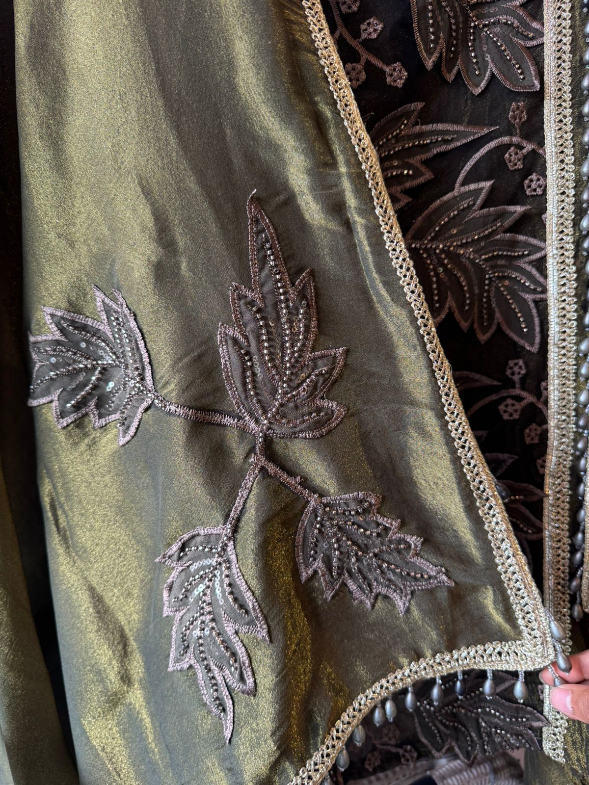 mesh/net fabric heavily embroidered with leaf and small floral motifs