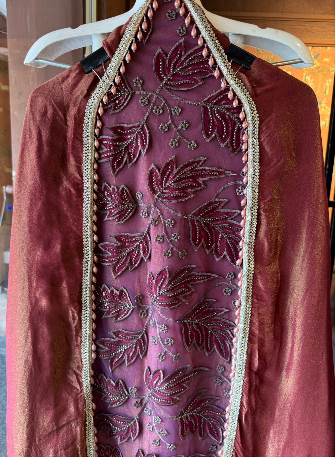 mesh/net fabric heavily embroidered with leaf and small floral motifs