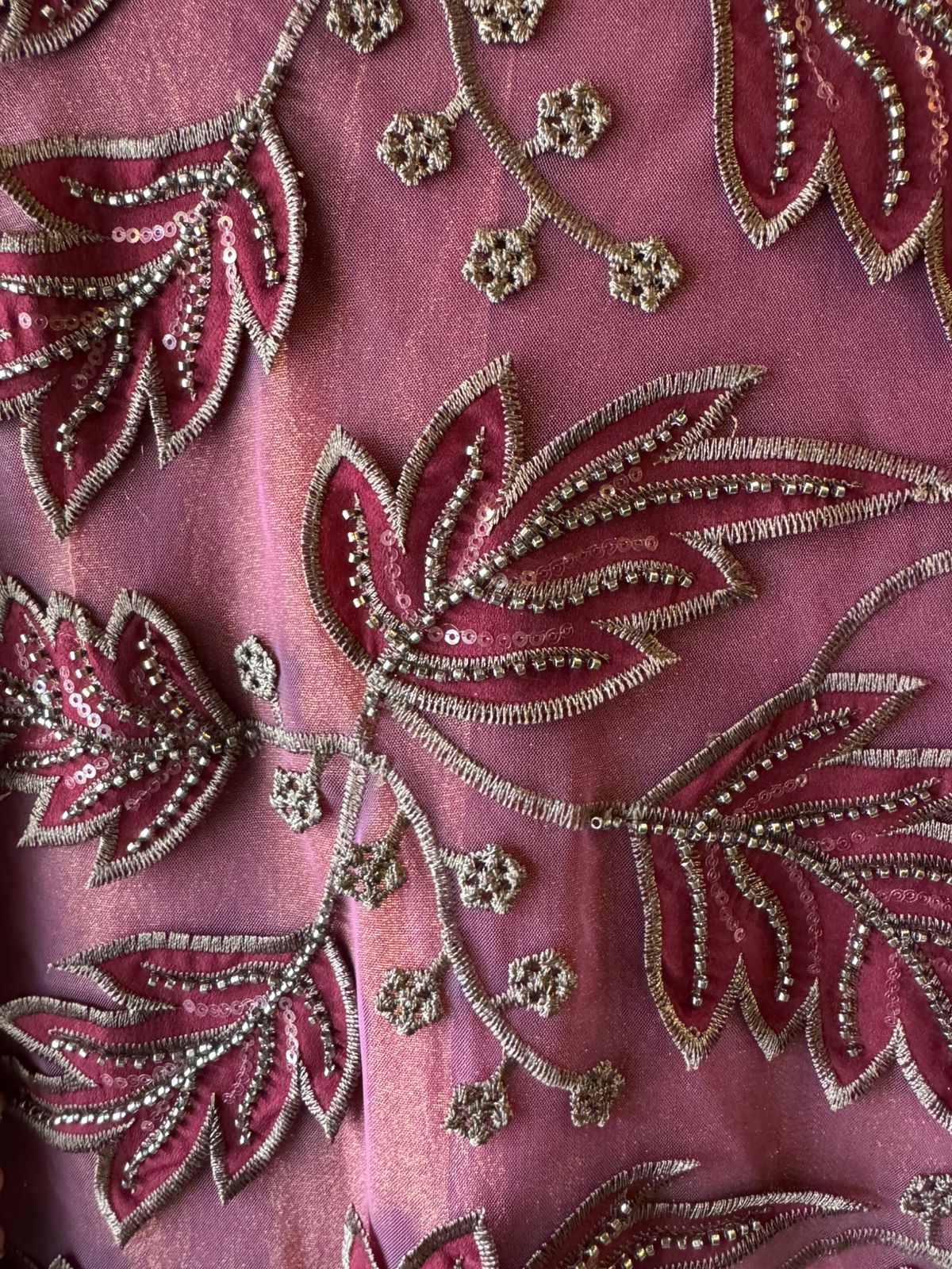 mesh/net fabric heavily embroidered with leaf and small floral motifs