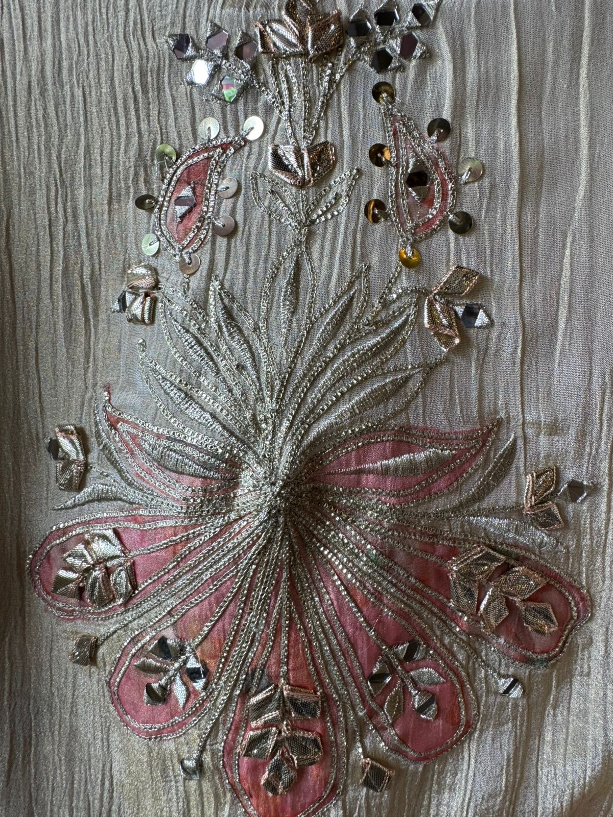 Traditional mirror work combined with delicate embroidery