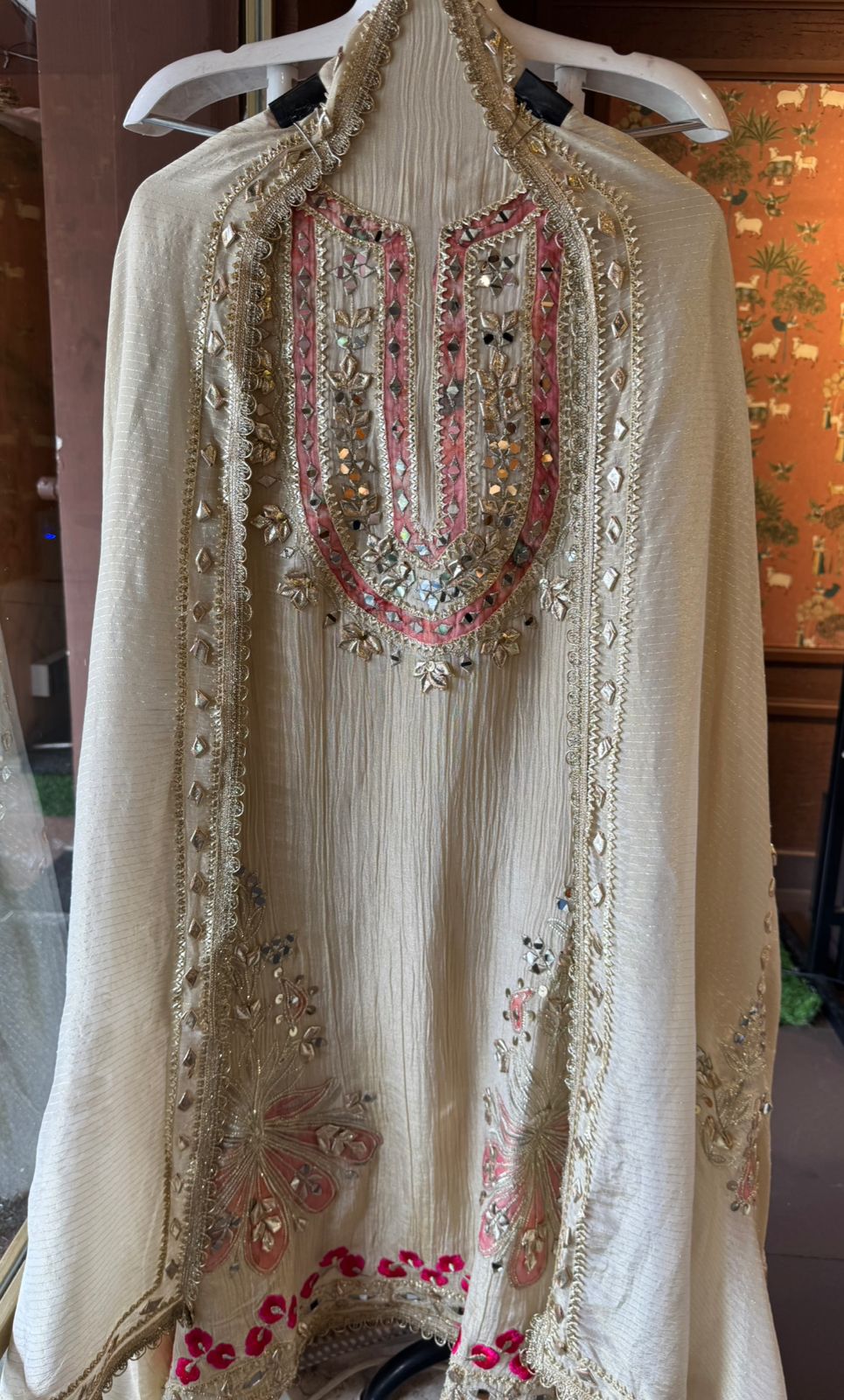 Traditional mirror work combined with delicate embroidery