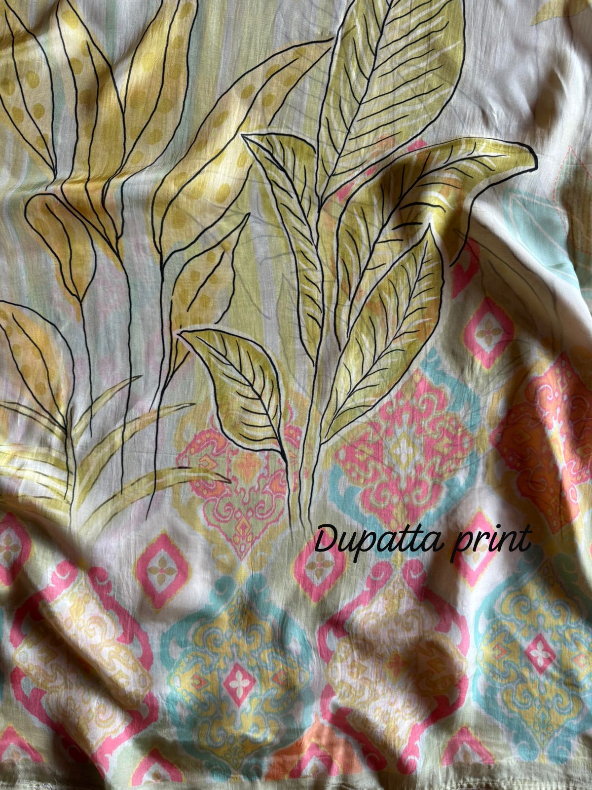 V-shape with heavy embroidered yoke