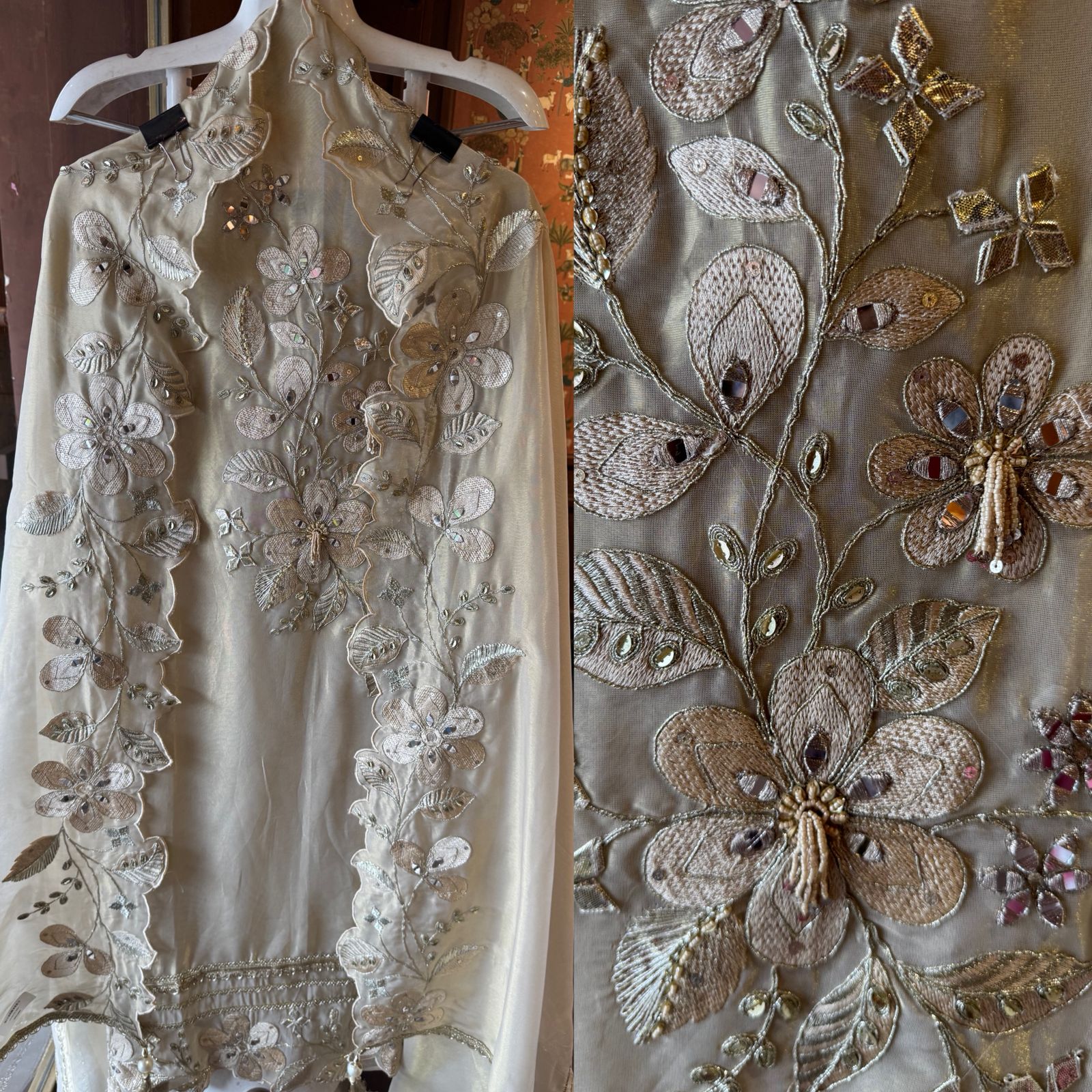 Ivory-beige base with heavy floral and leaf embroidery