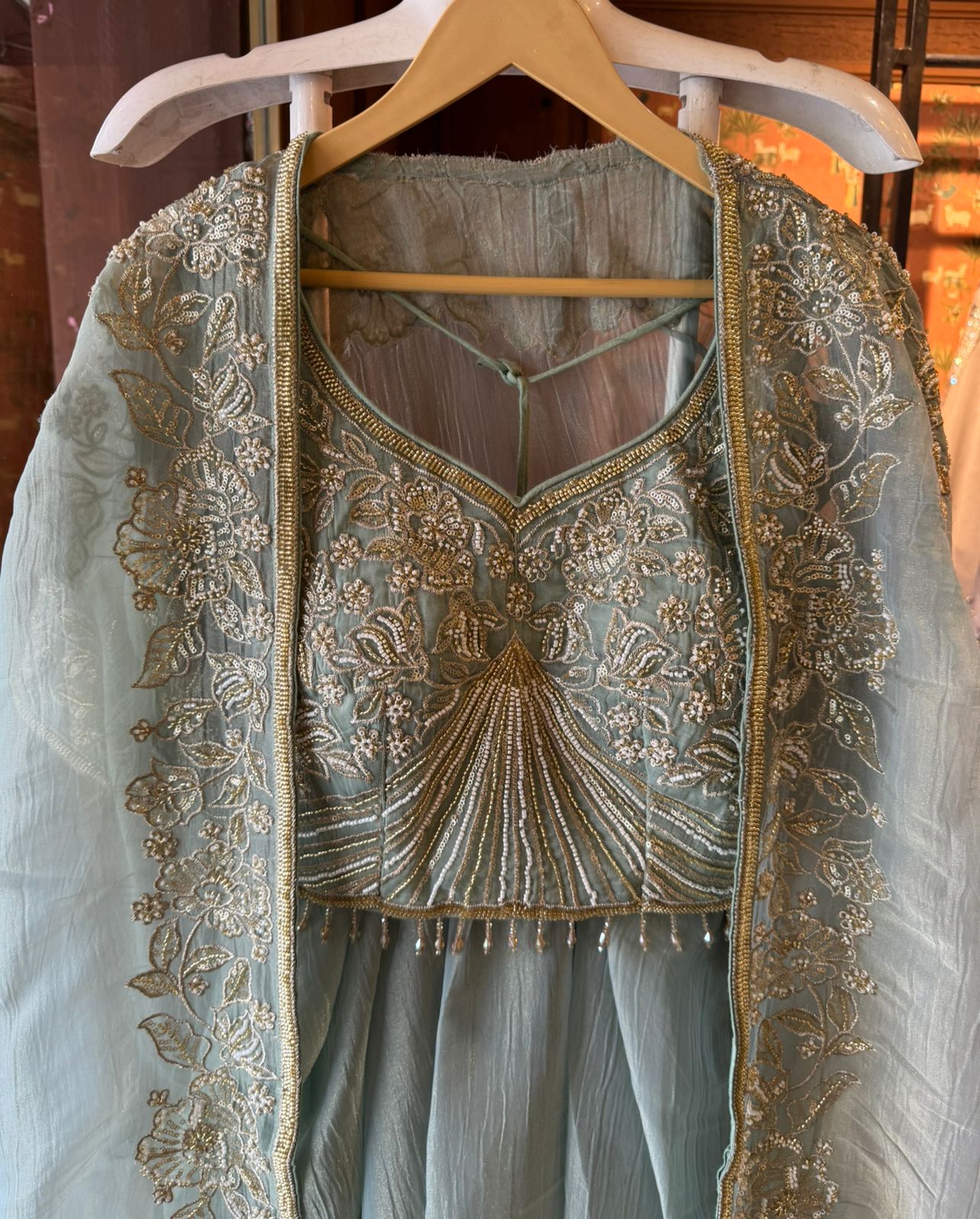 Hand embroidered suit set with cape style dupatta