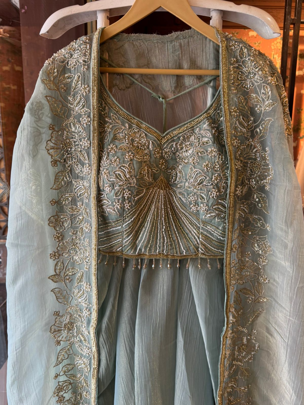 Hand embroidered suit set with cape style dupatta