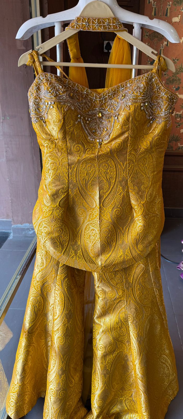 Indo-western set with a peplum-style top and flared gharara’s