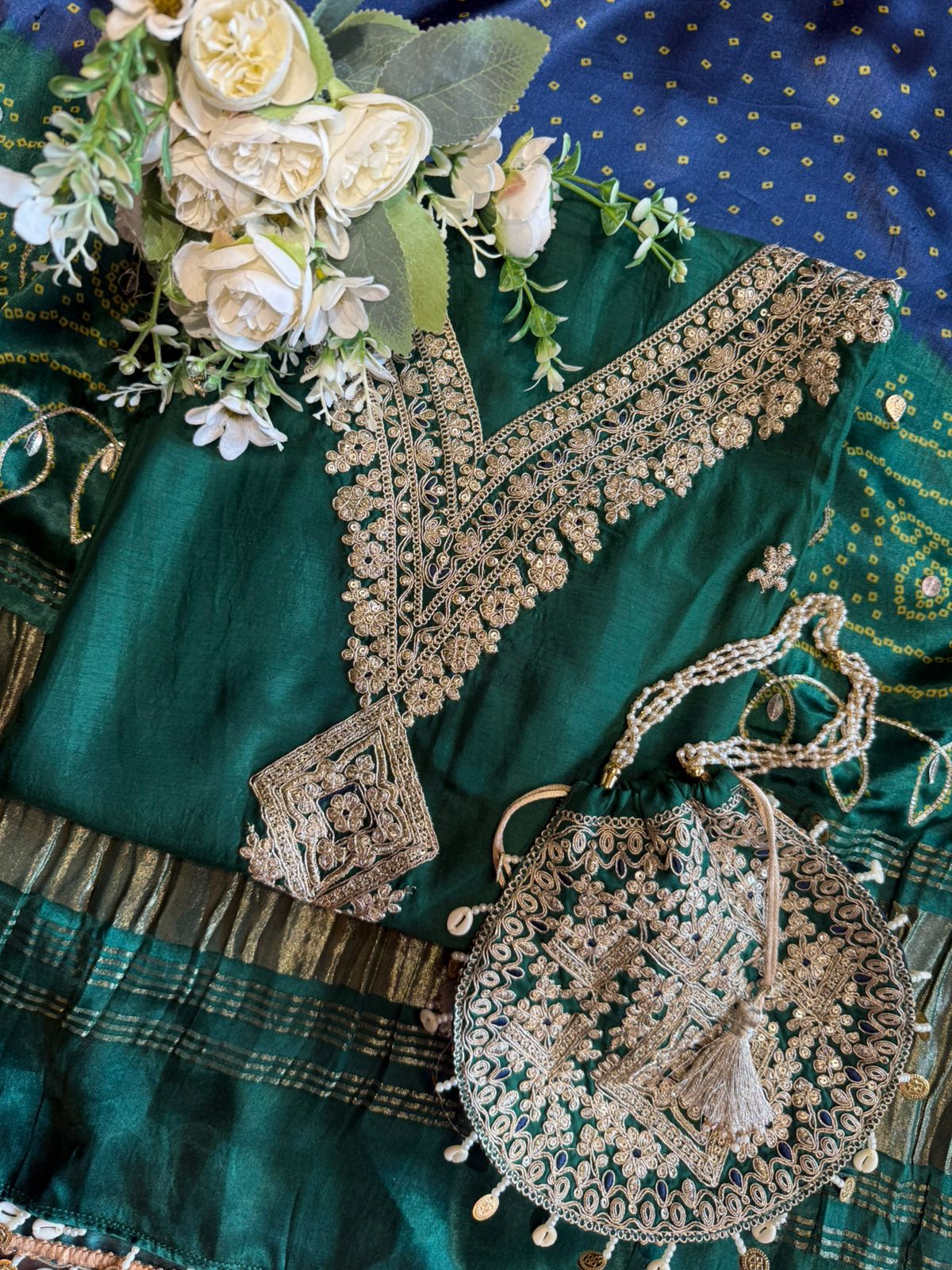 Unstitched Suit collections with Potli bags