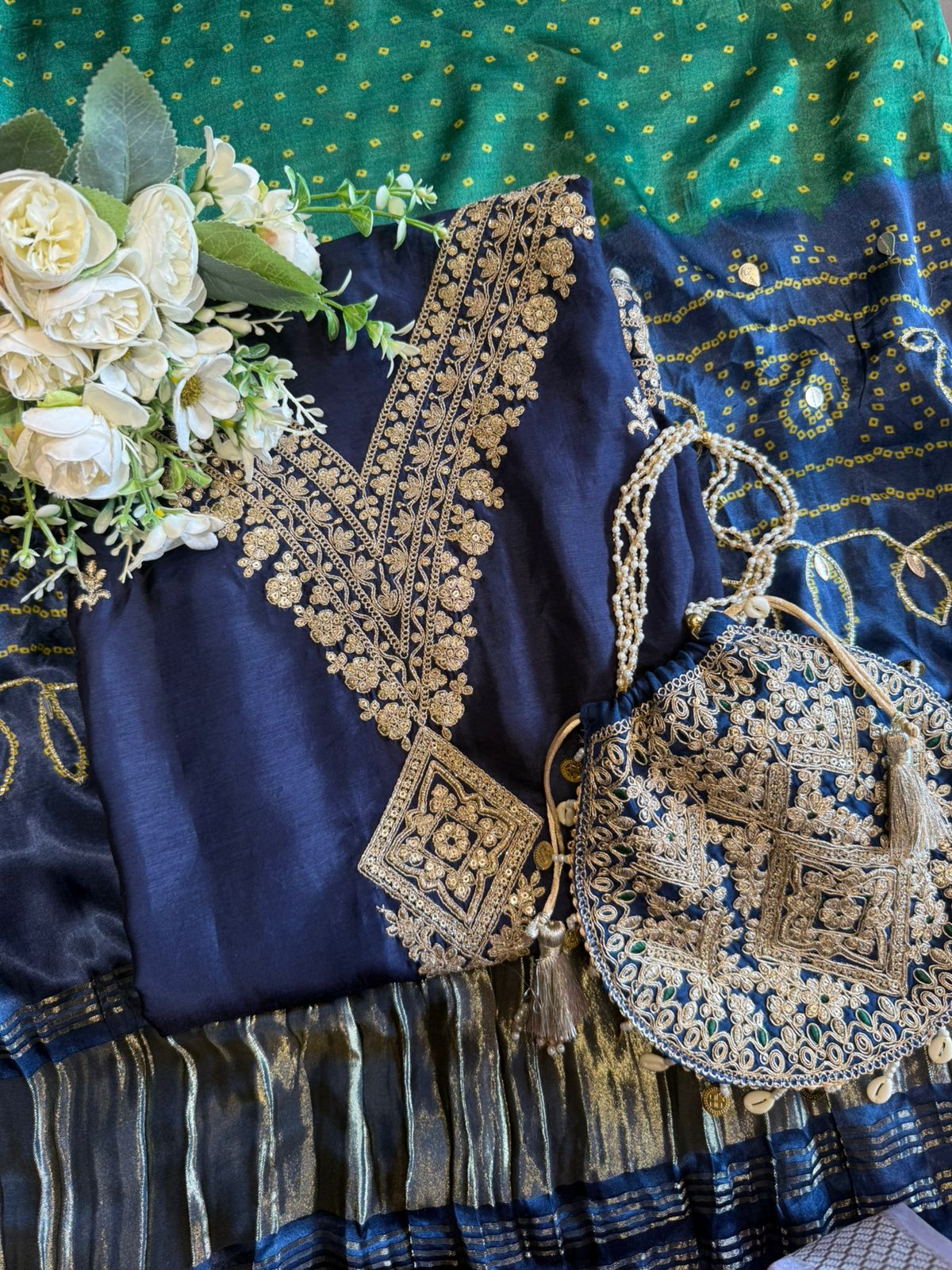 Unstitched Suit collections with Potli bags