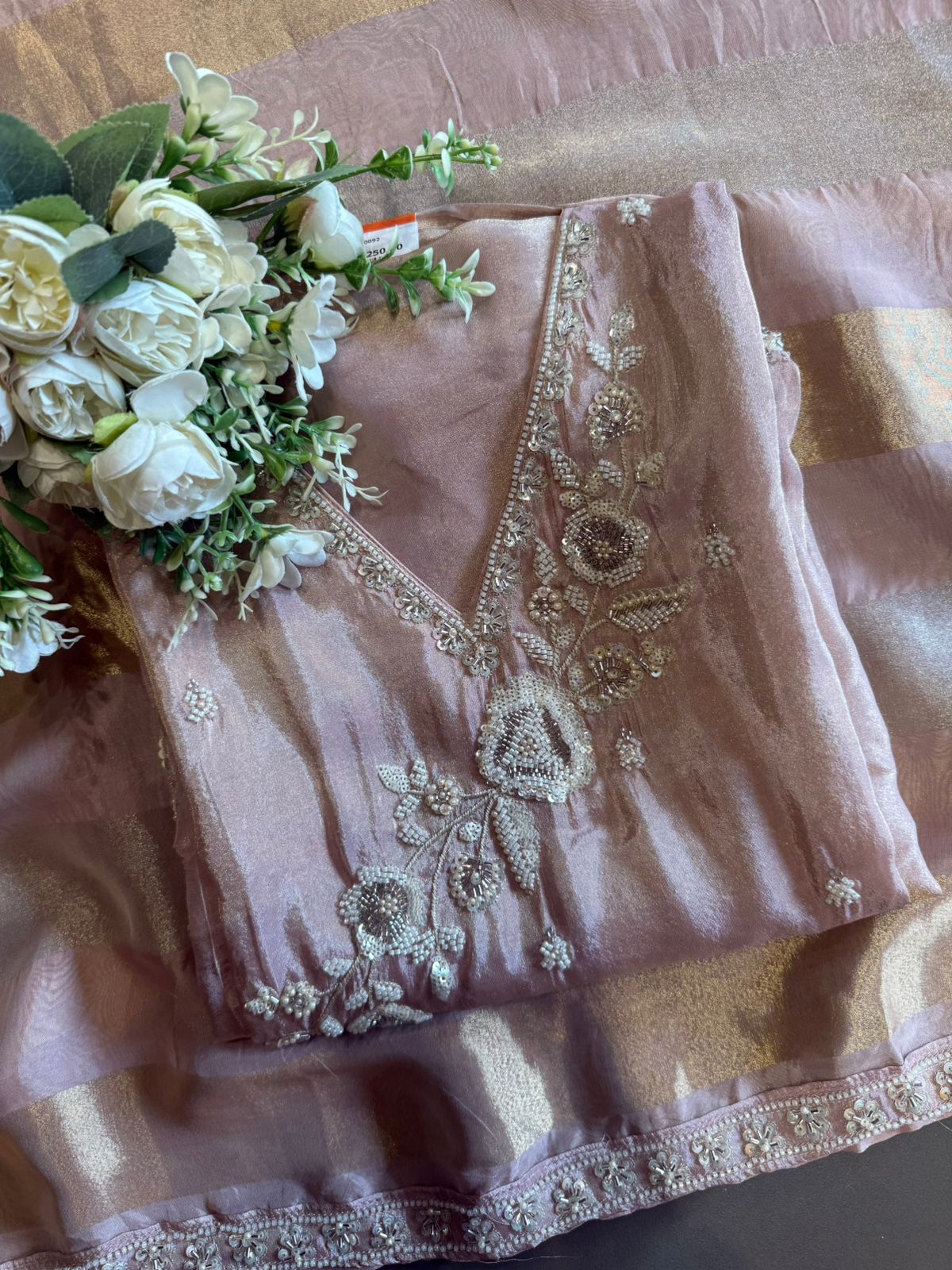 elegant suit set with intricate and delicate embroidery work