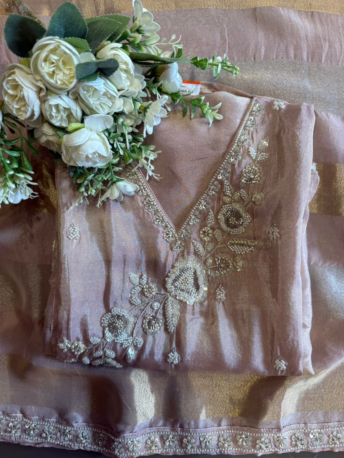 elegant suit set with intricate and delicate embroidery work