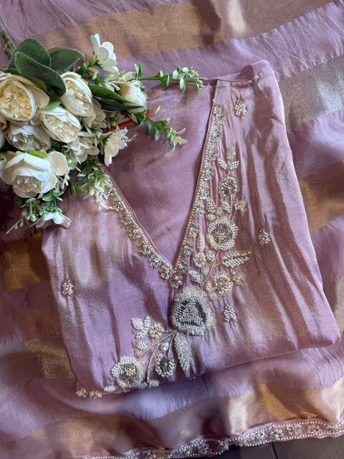 elegant suit set with intricate and delicate embroidery work