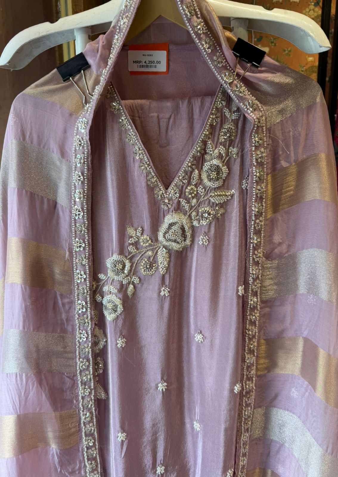 elegant suit set with intricate and delicate embroidery work