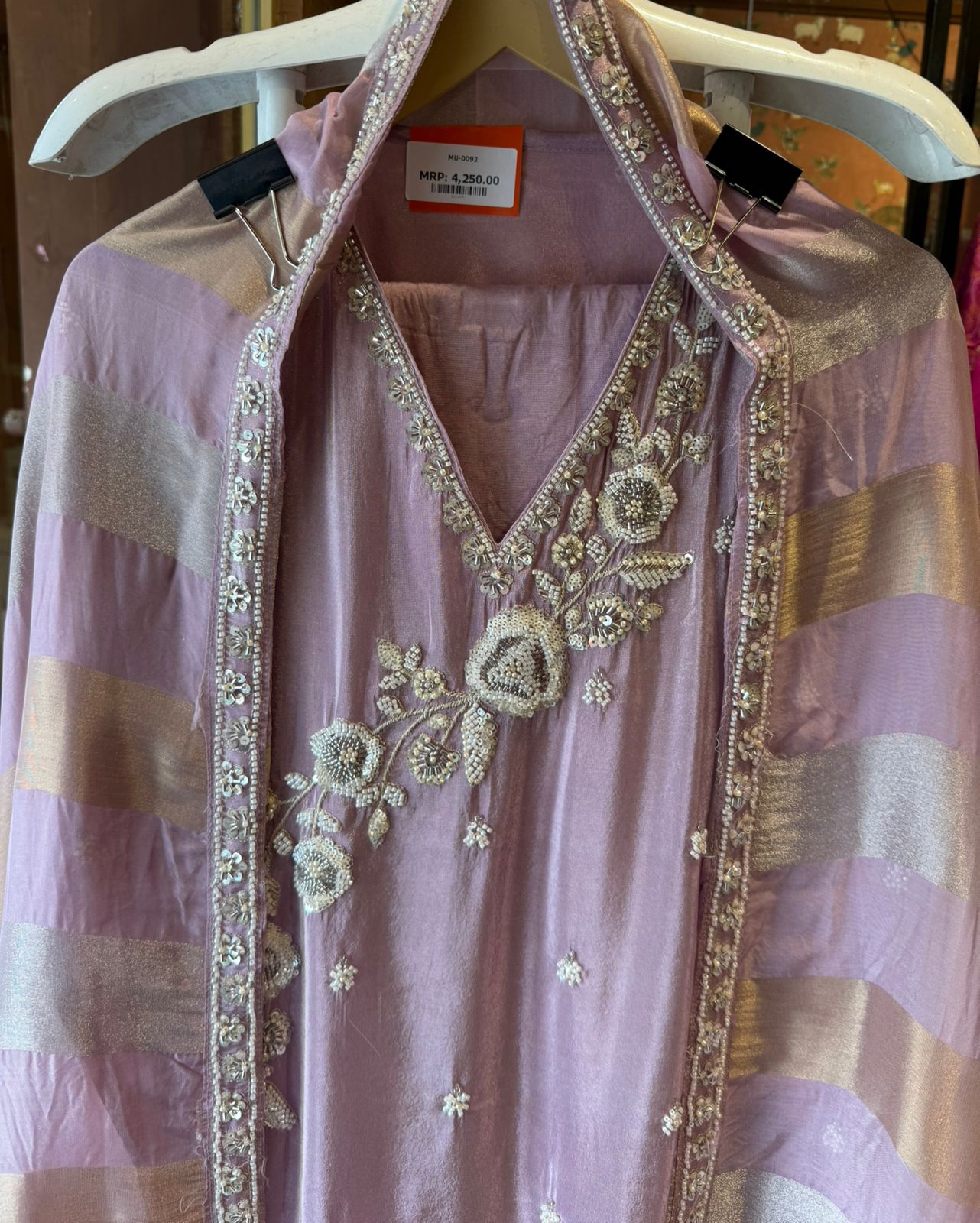 elegant suit set with intricate and delicate embroidery work