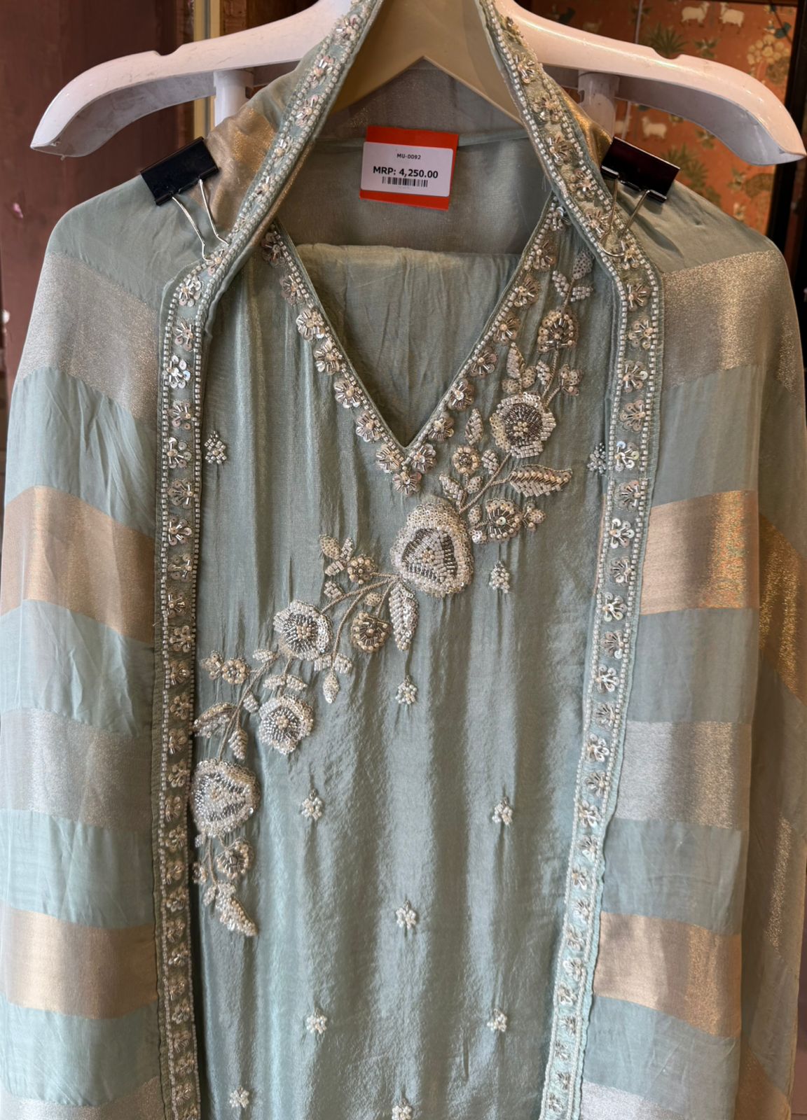 elegant suit set with intricate and delicate embroidery work