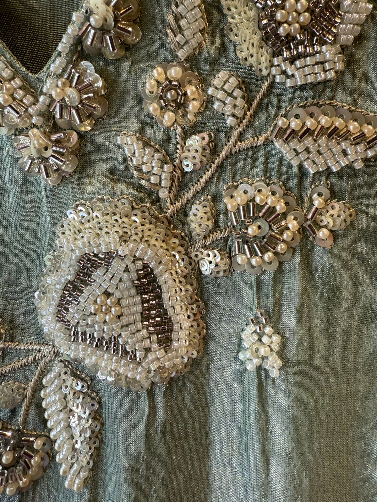 elegant suit set with intricate and delicate embroidery work