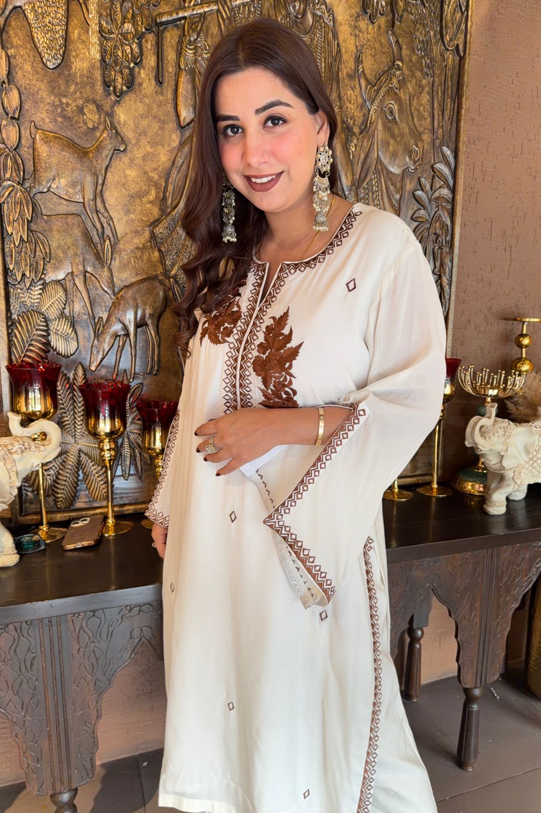 White-colored kurta featuring elegant embroidery
