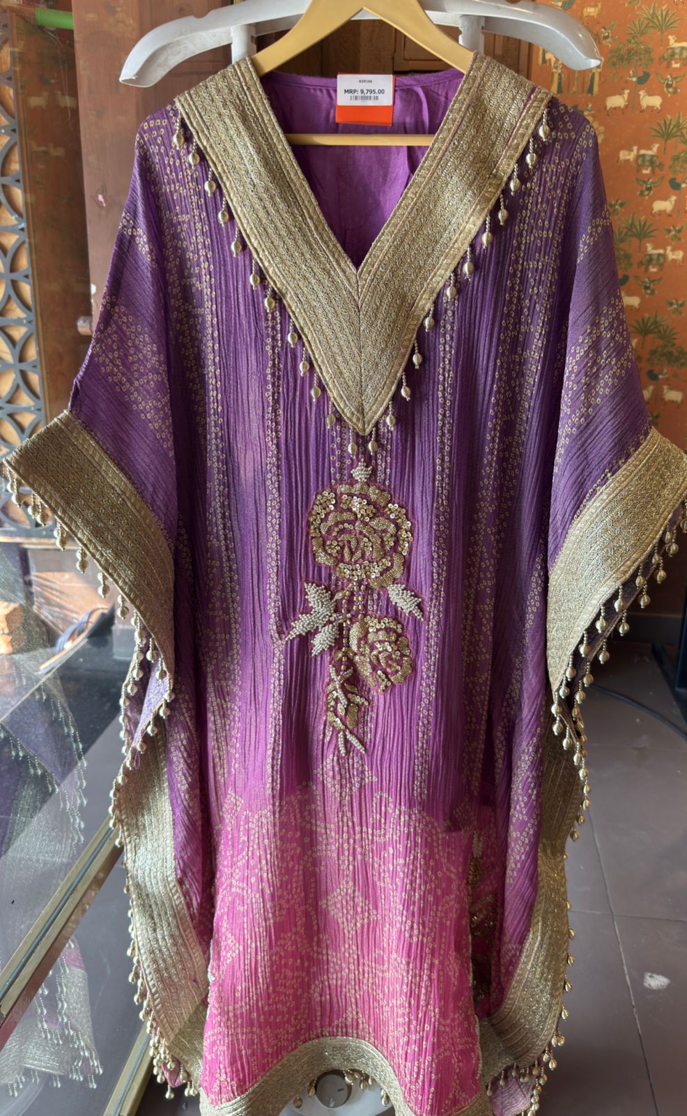 Kaftan dress featuring a vibrant ombré color