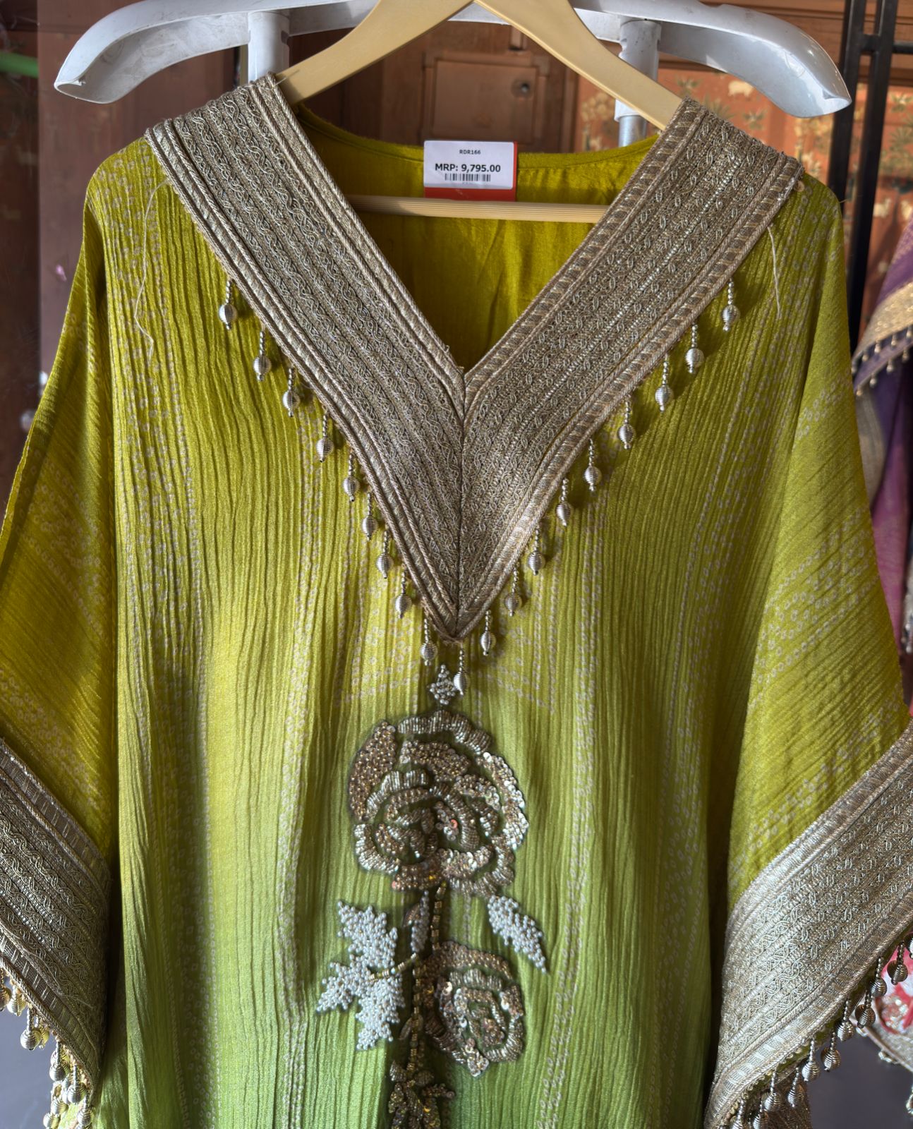 Kaftan dress featuring a vibrant ombré color