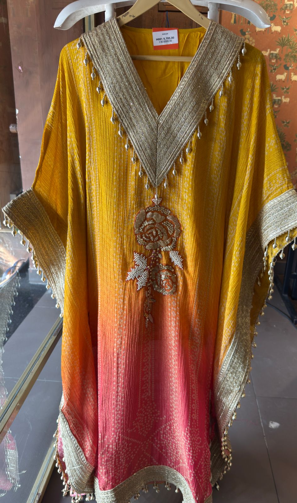 Kaftan dress featuring a vibrant ombré color