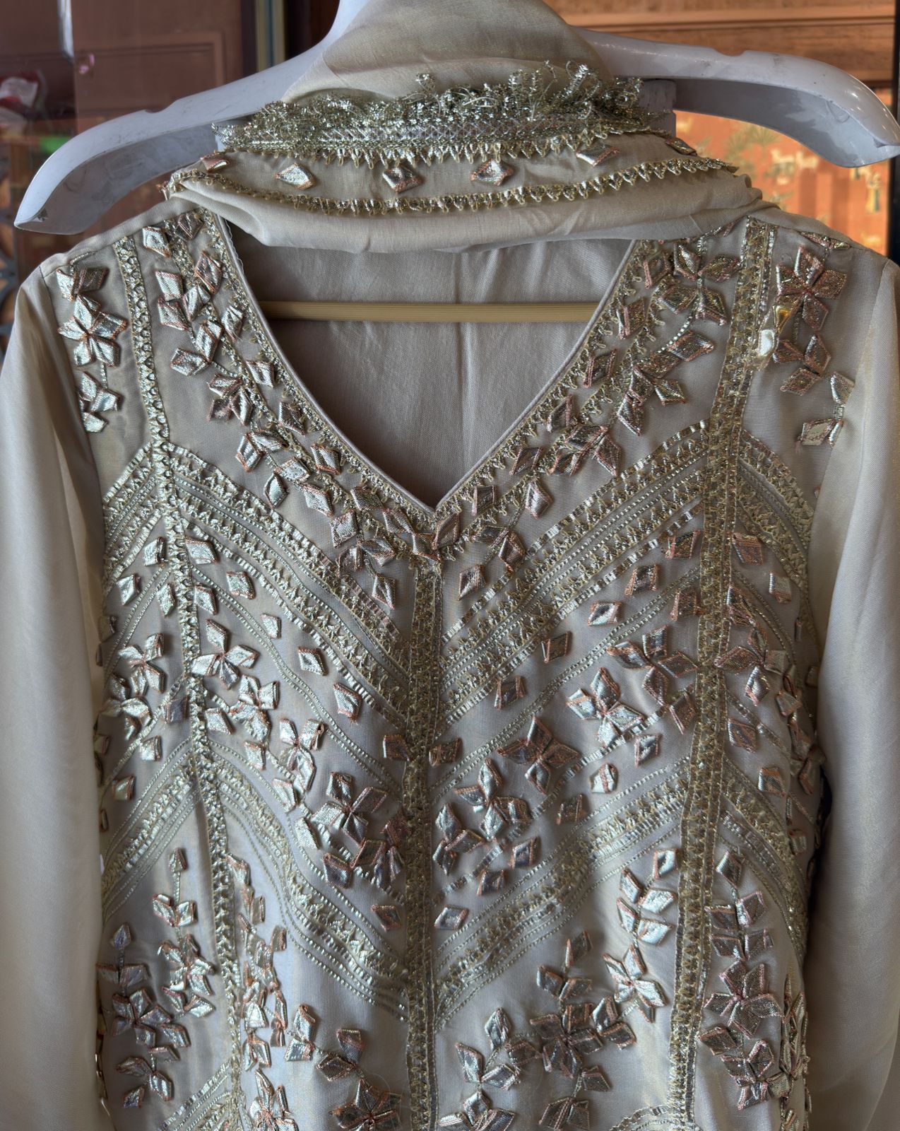 Elegant beige or off-white traditional suit