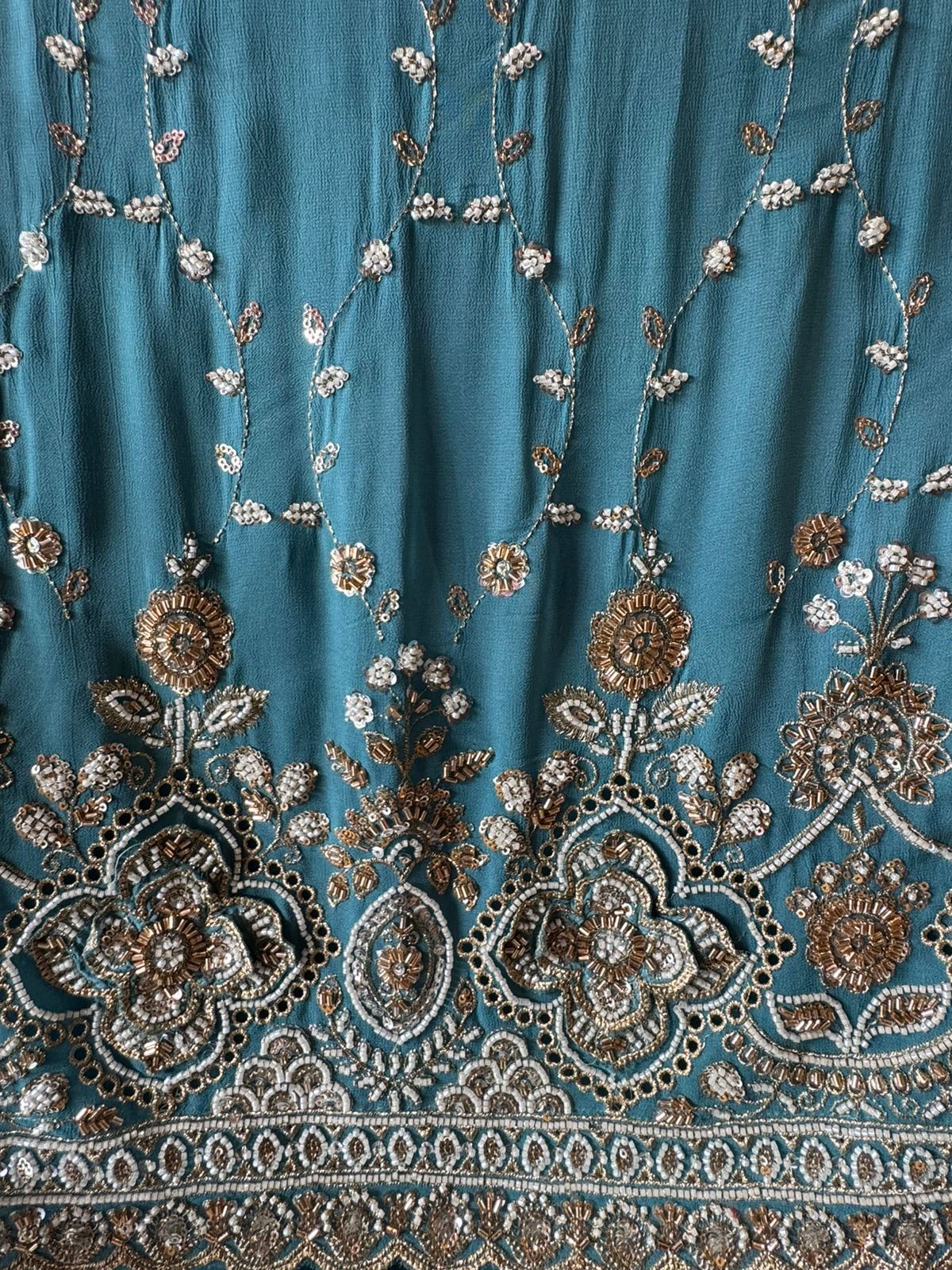 heavily embellished ethnic suit