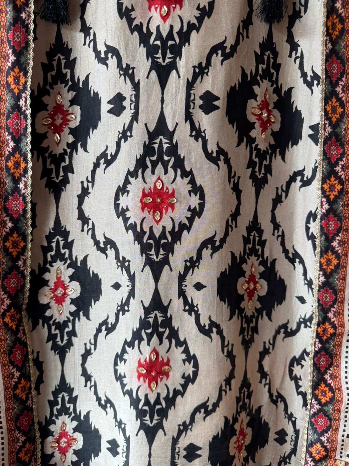 Ikat-inspired black motifs