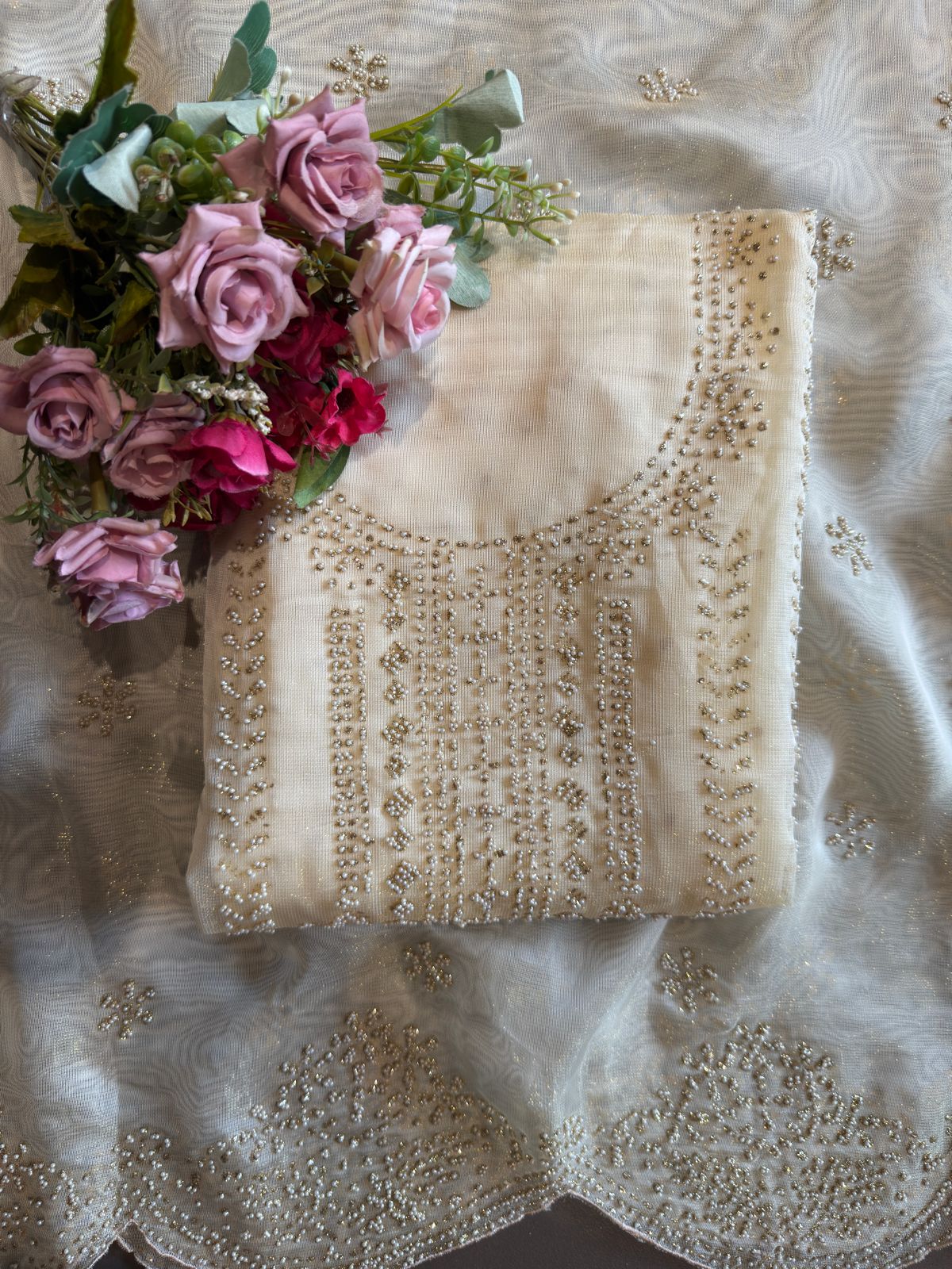 Off-white traditional ensemble