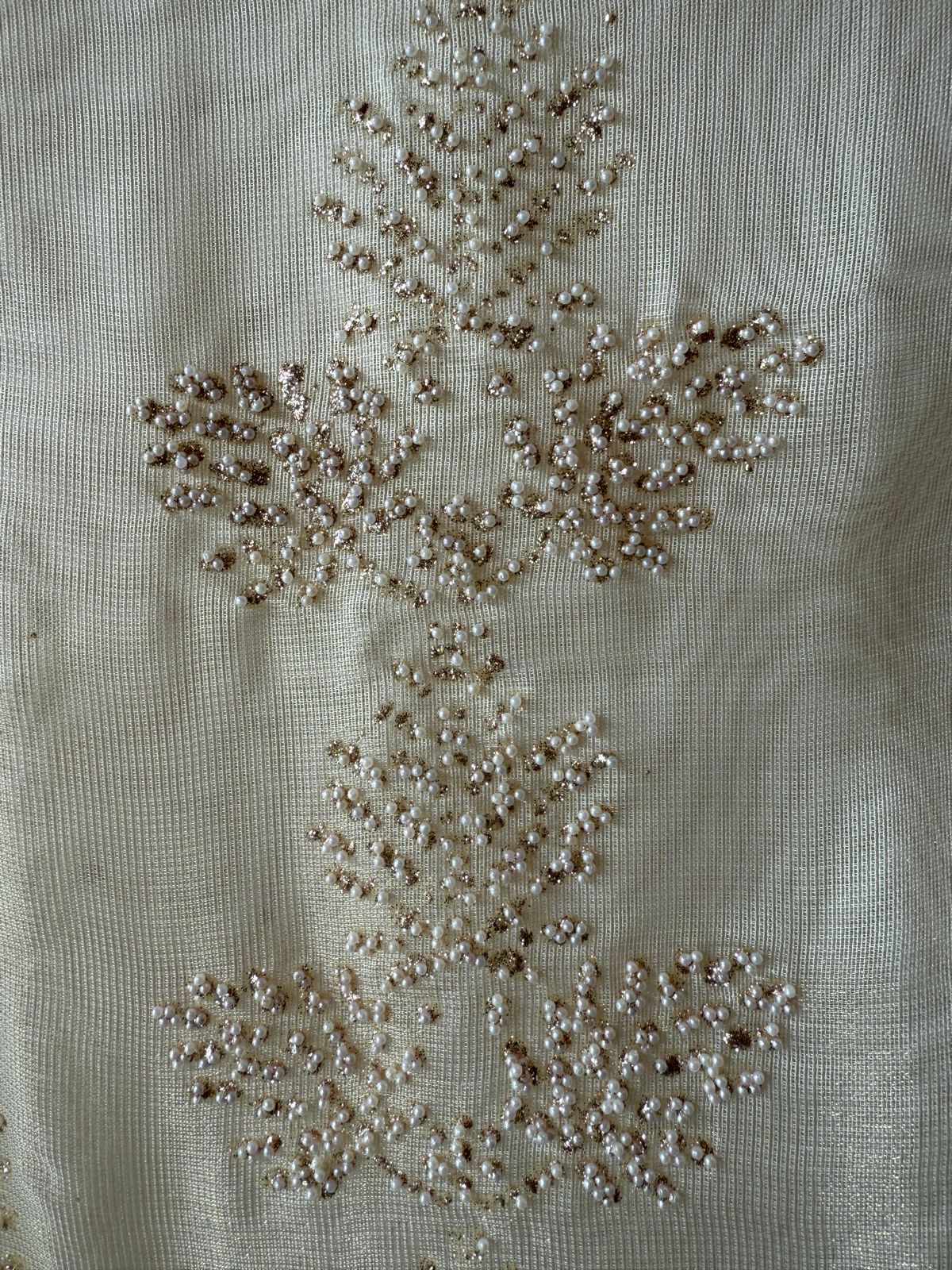 Off-white traditional ensemble