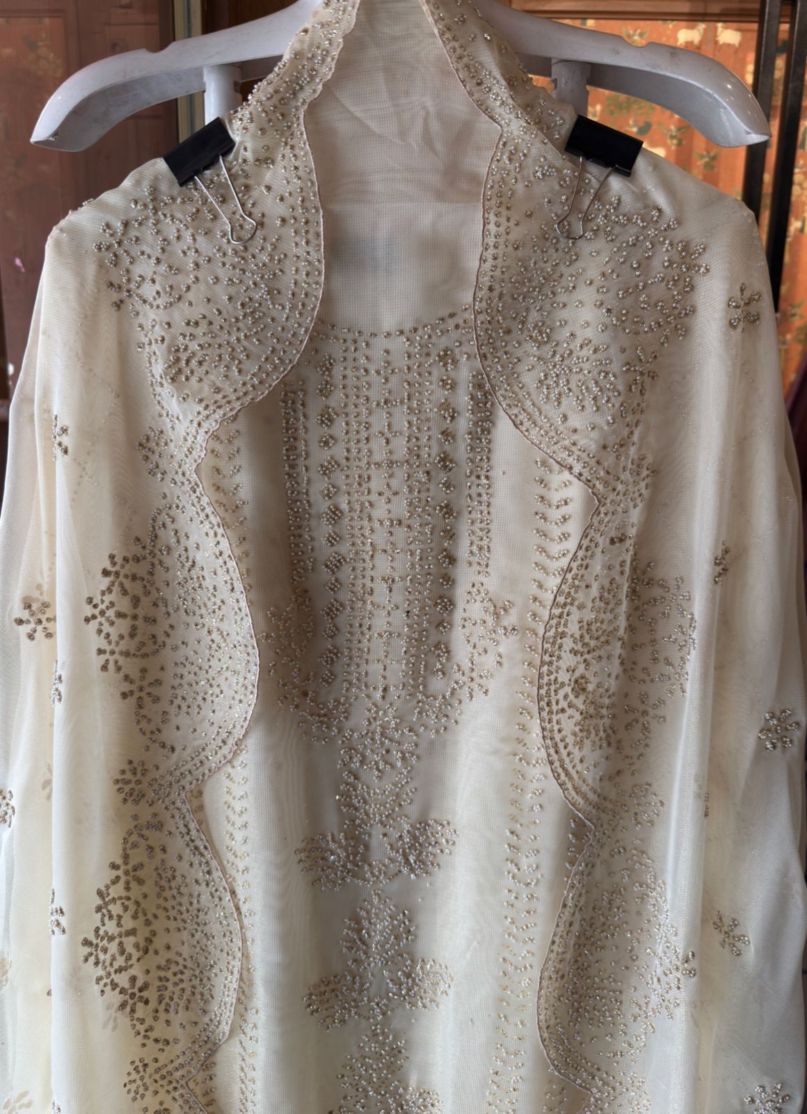 Off-white traditional ensemble