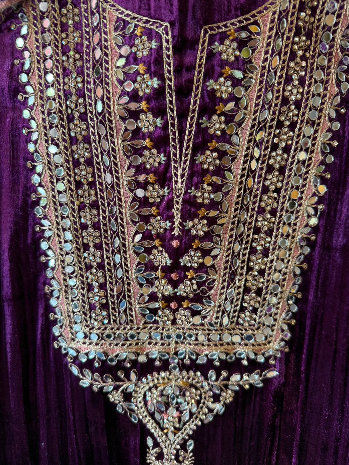 Heavily hand-worked velvet suit