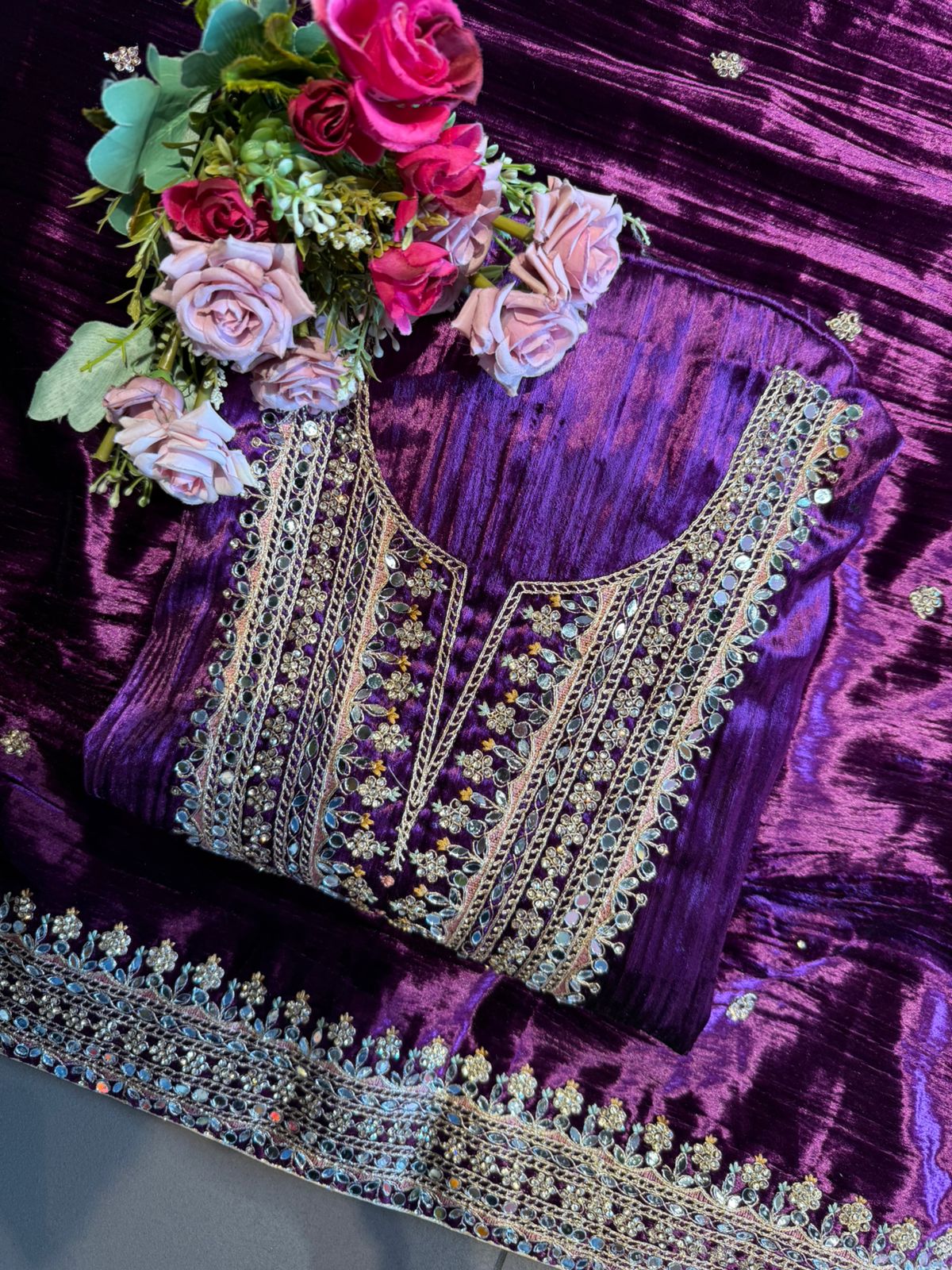 Heavily hand-worked velvet suit