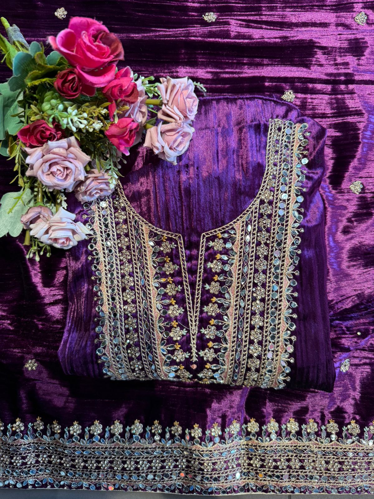 Heavily hand-worked velvet suit